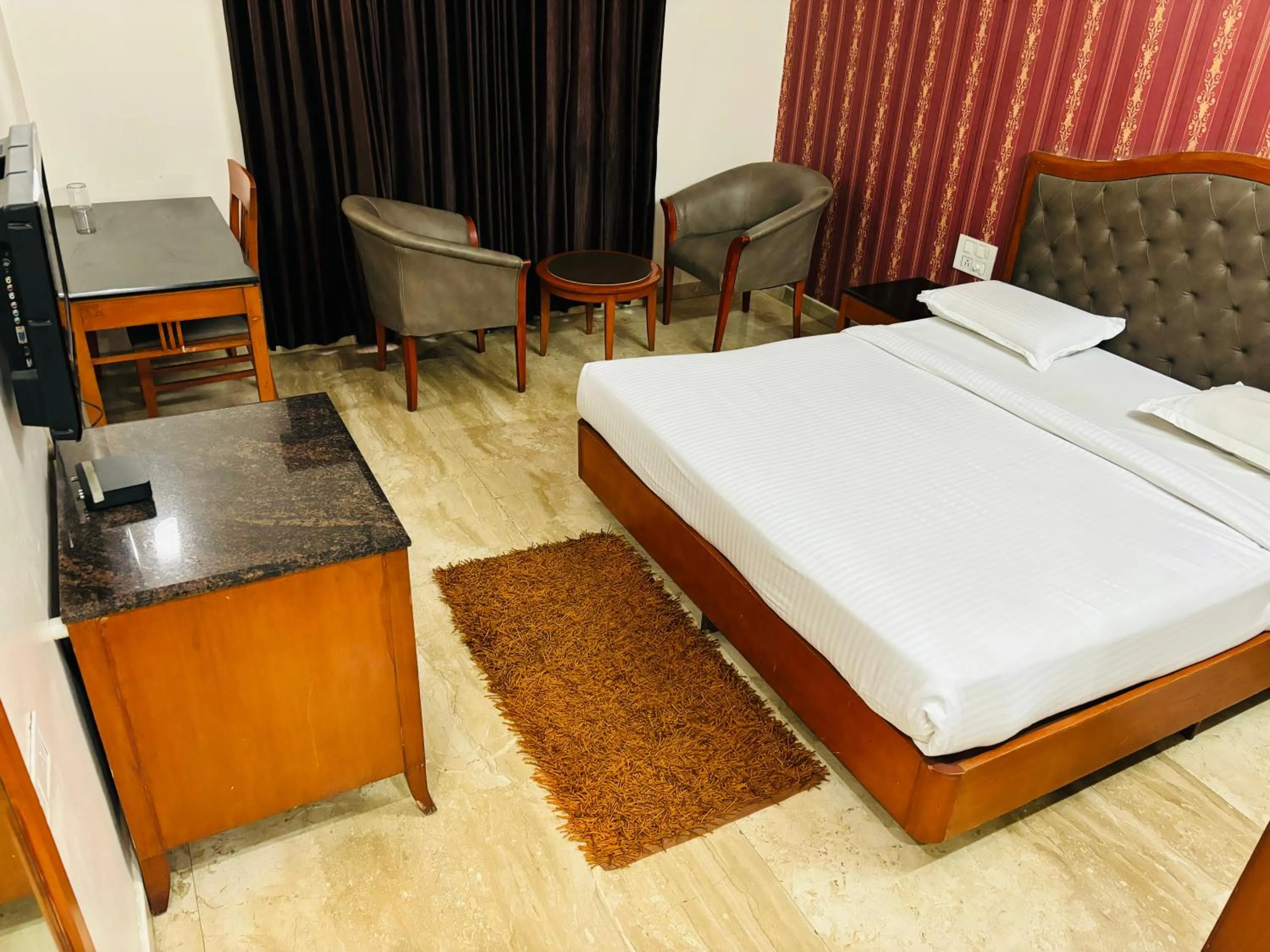 Bed in Hotel Chetan International