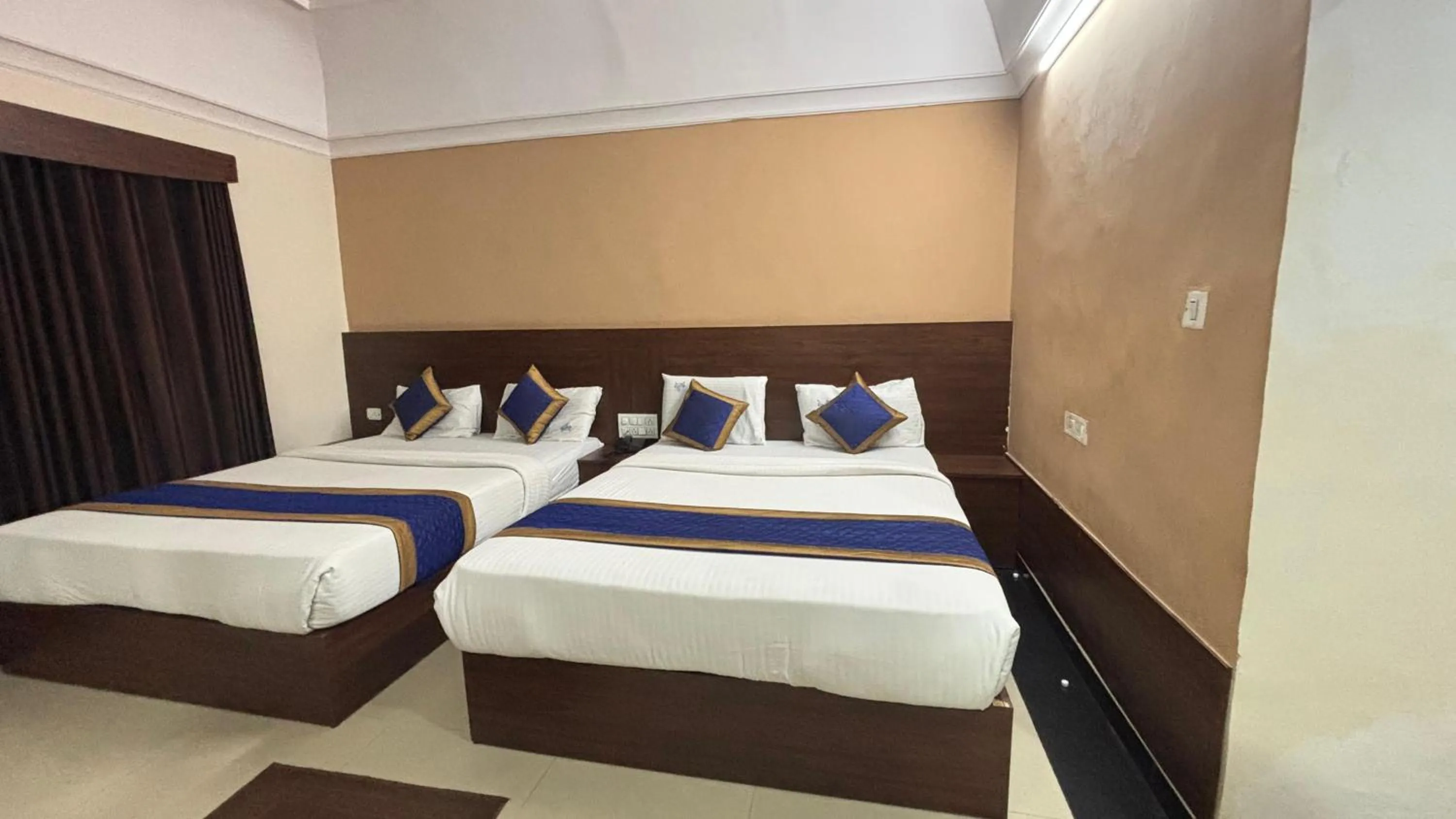 Bed in Hotel Chetan International