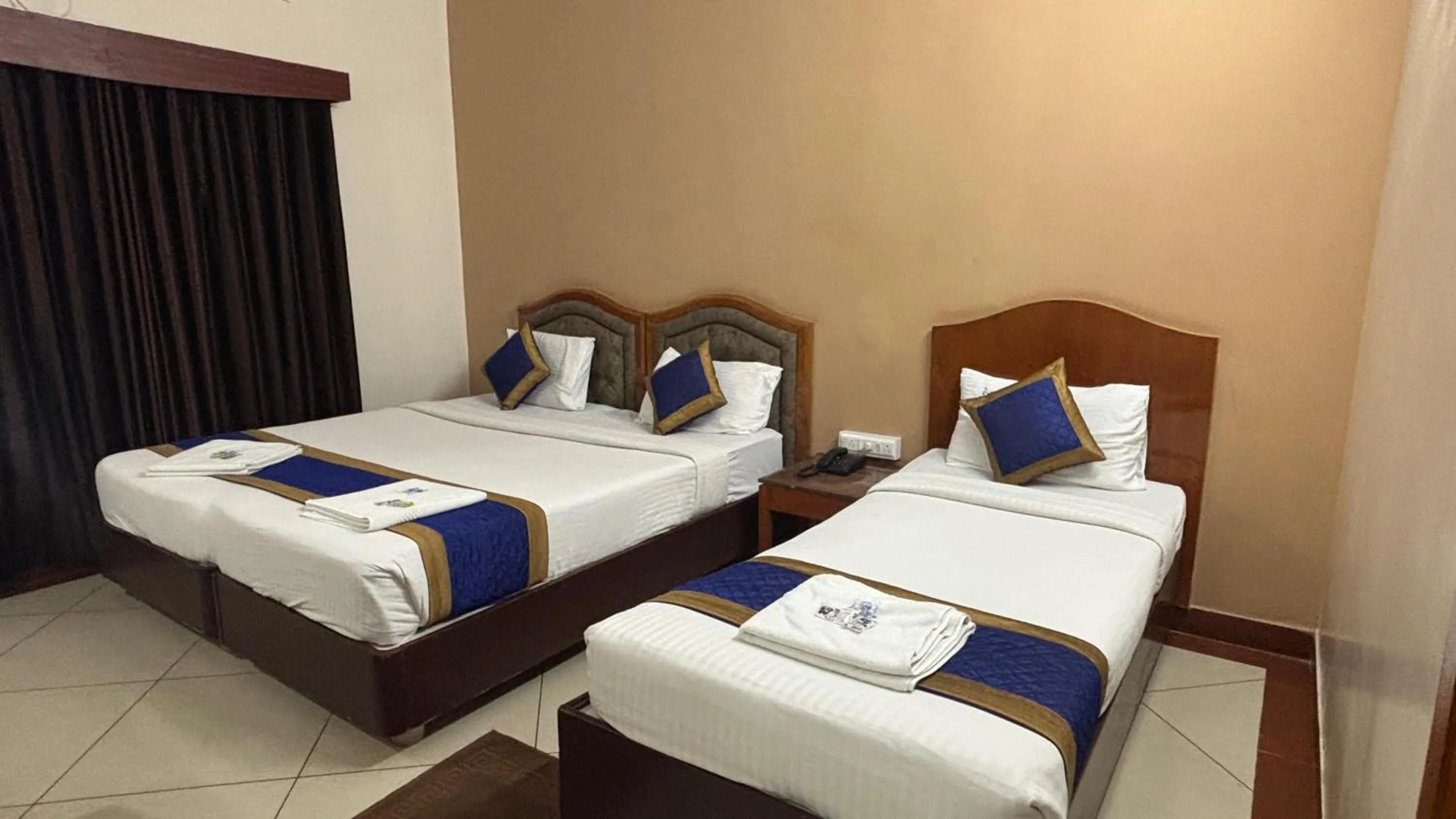 Bed in Hotel Chetan International