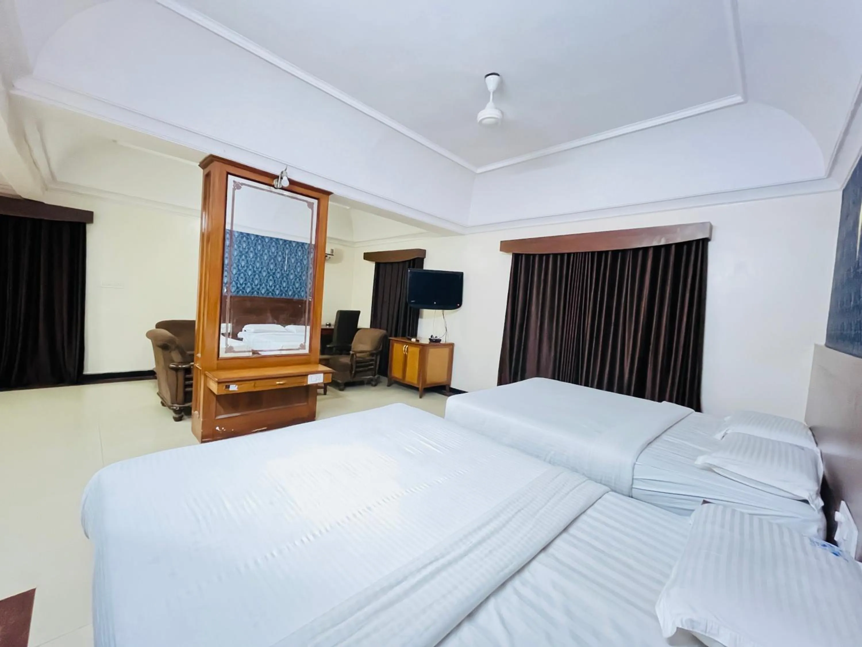 Bed in Hotel Chetan International