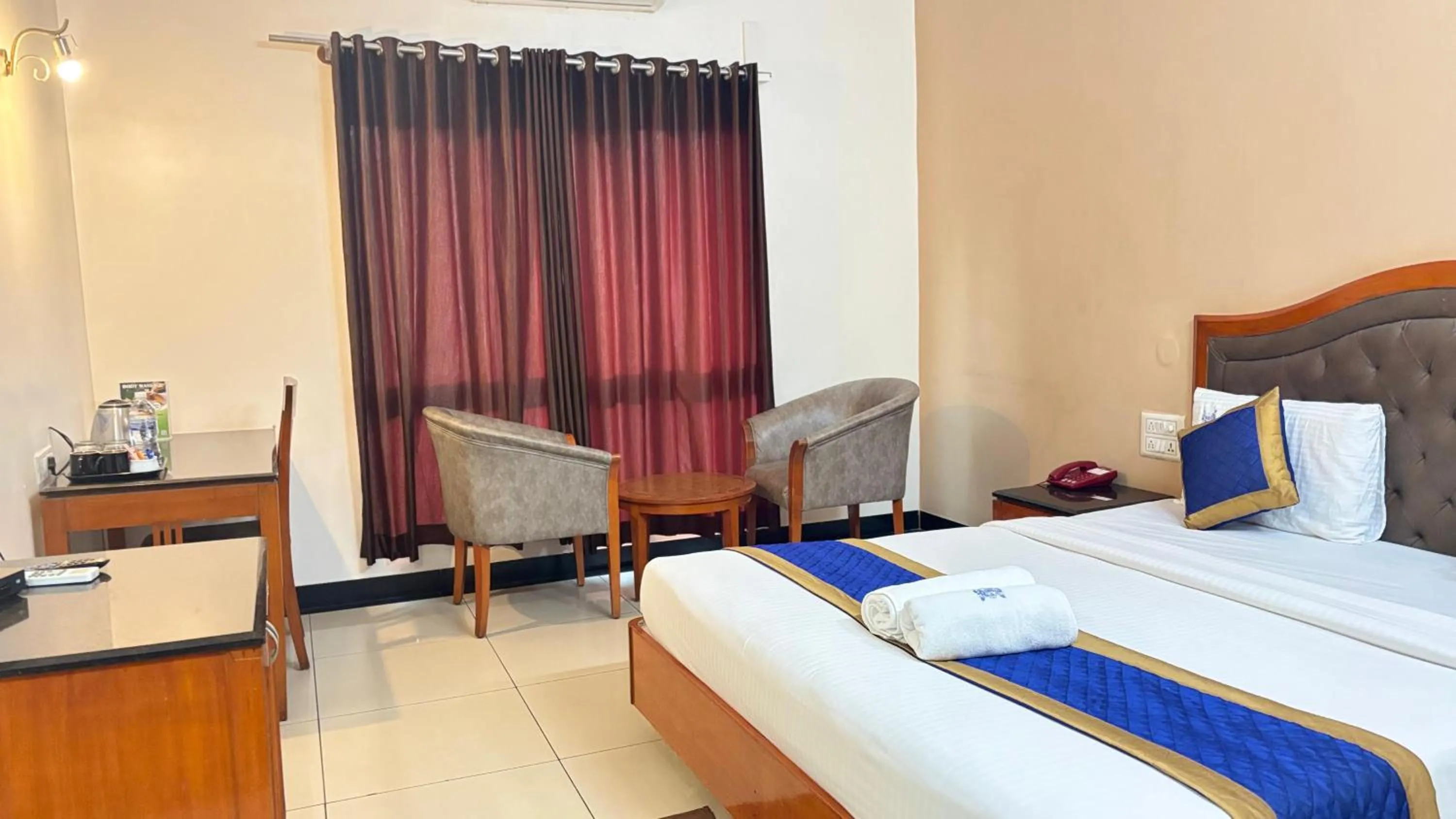 Bed in Hotel Chetan International