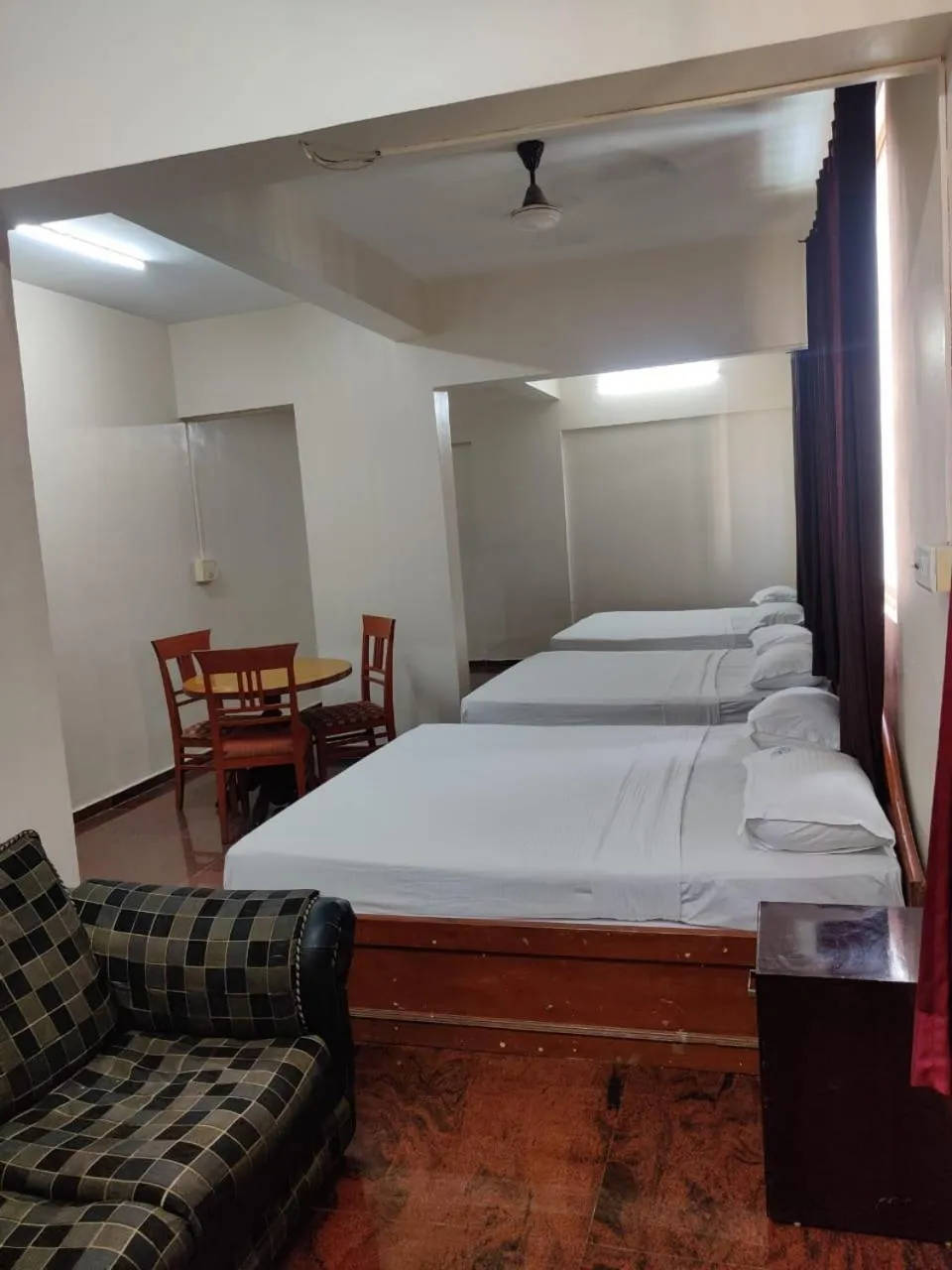 Bed in Hotel Chetan International