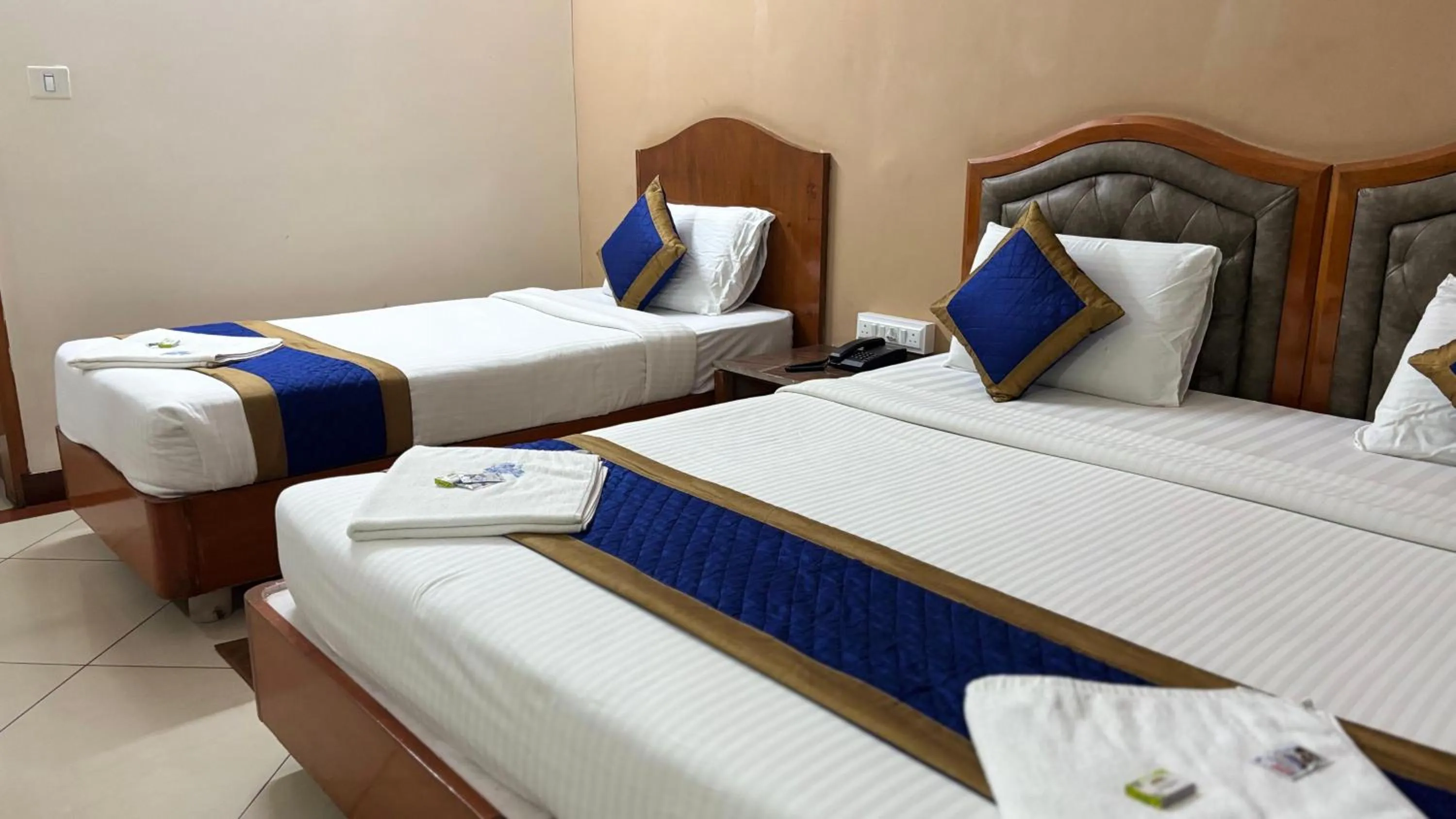 Bed in Hotel Chetan International