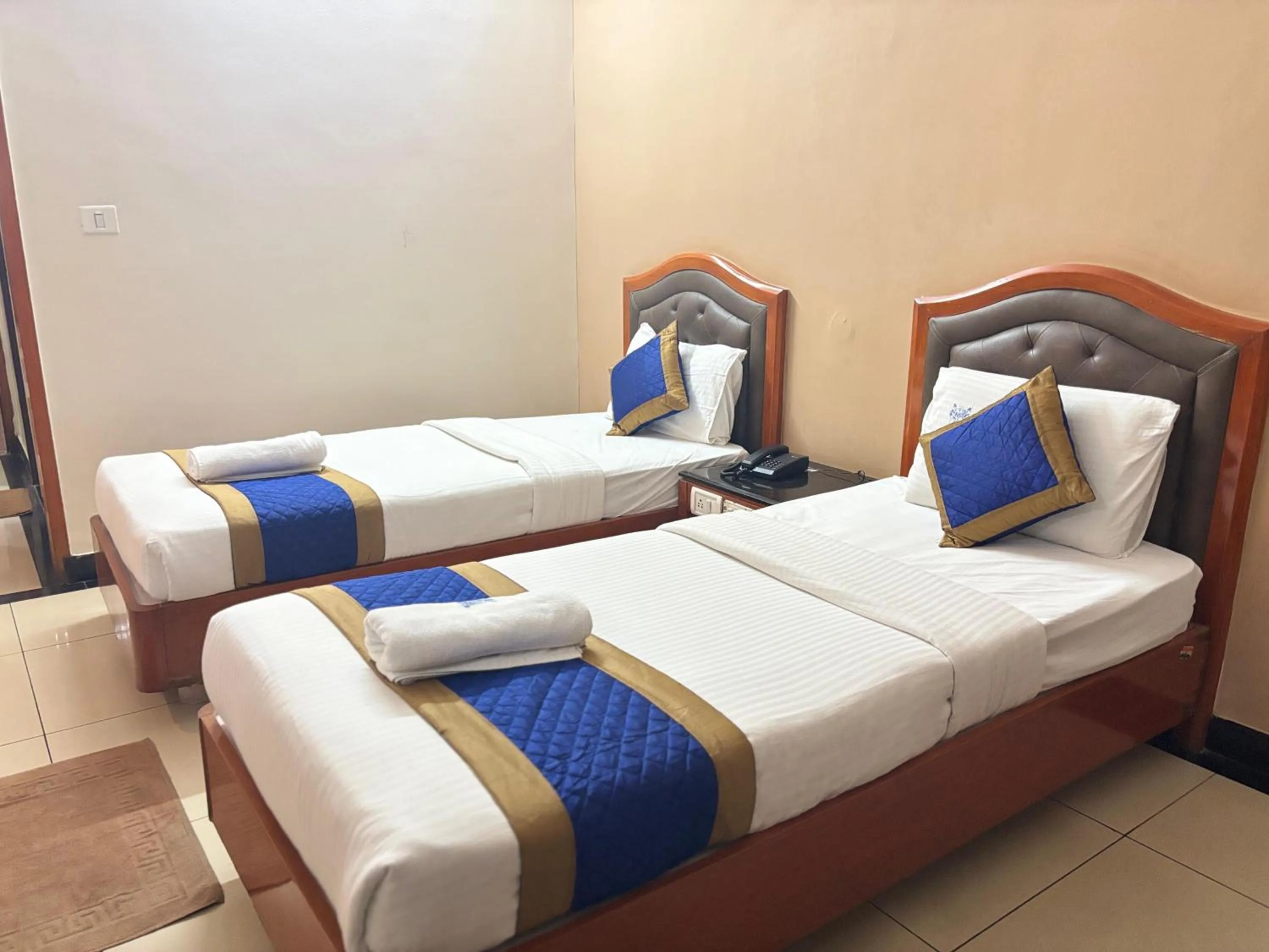 Bed in Hotel Chetan International