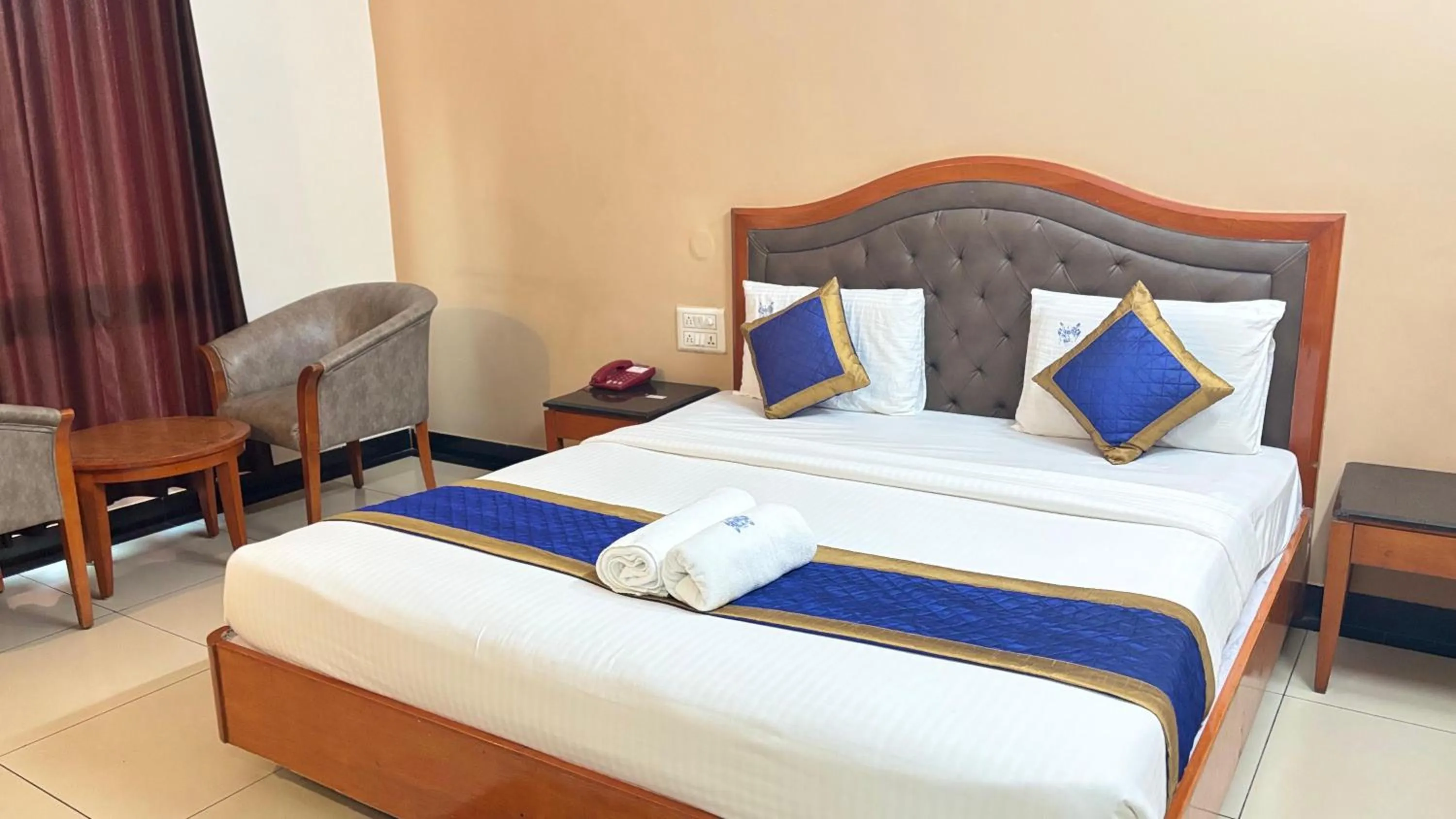 Bed in Hotel Chetan International