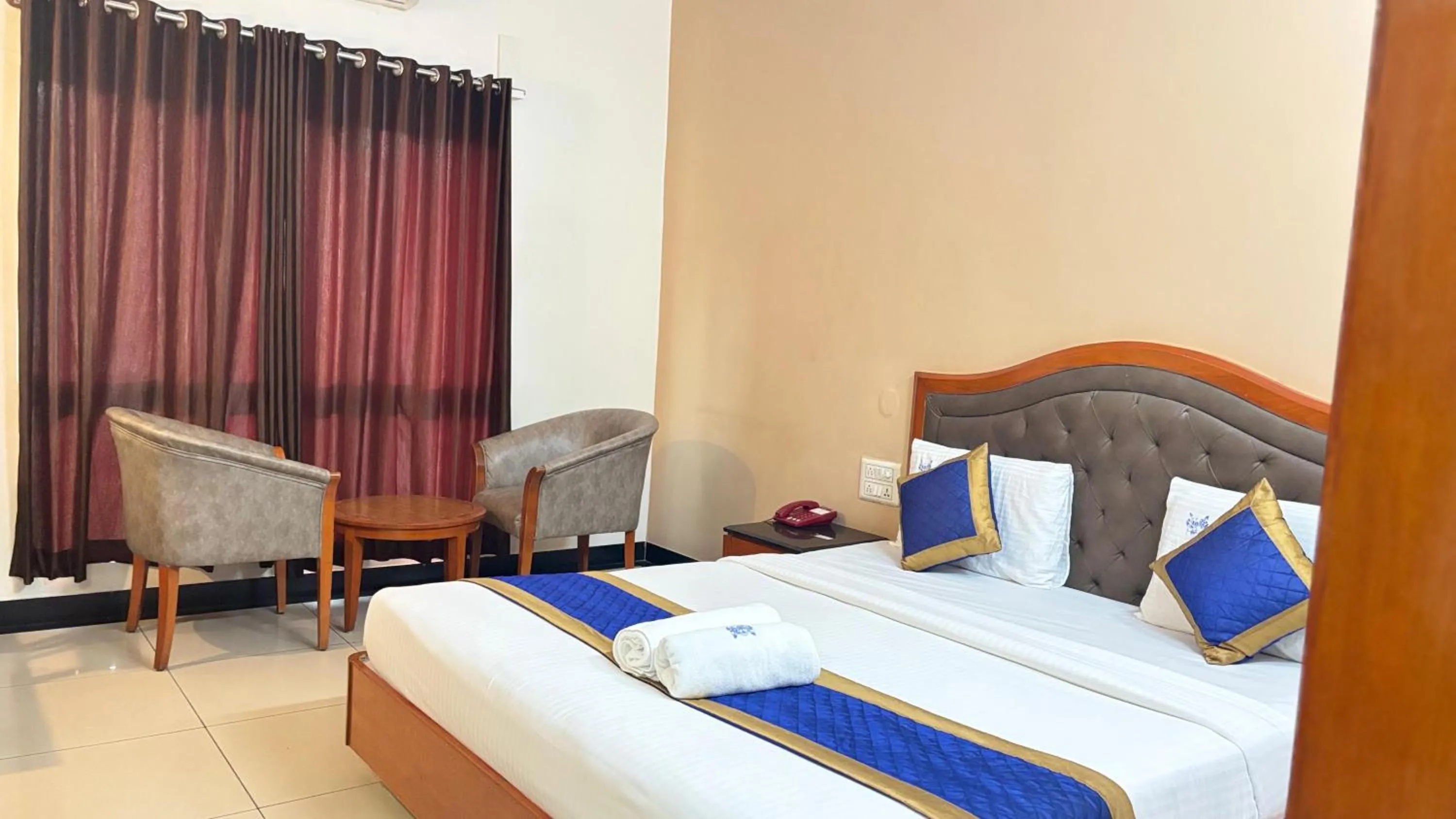 Bed in Hotel Chetan International