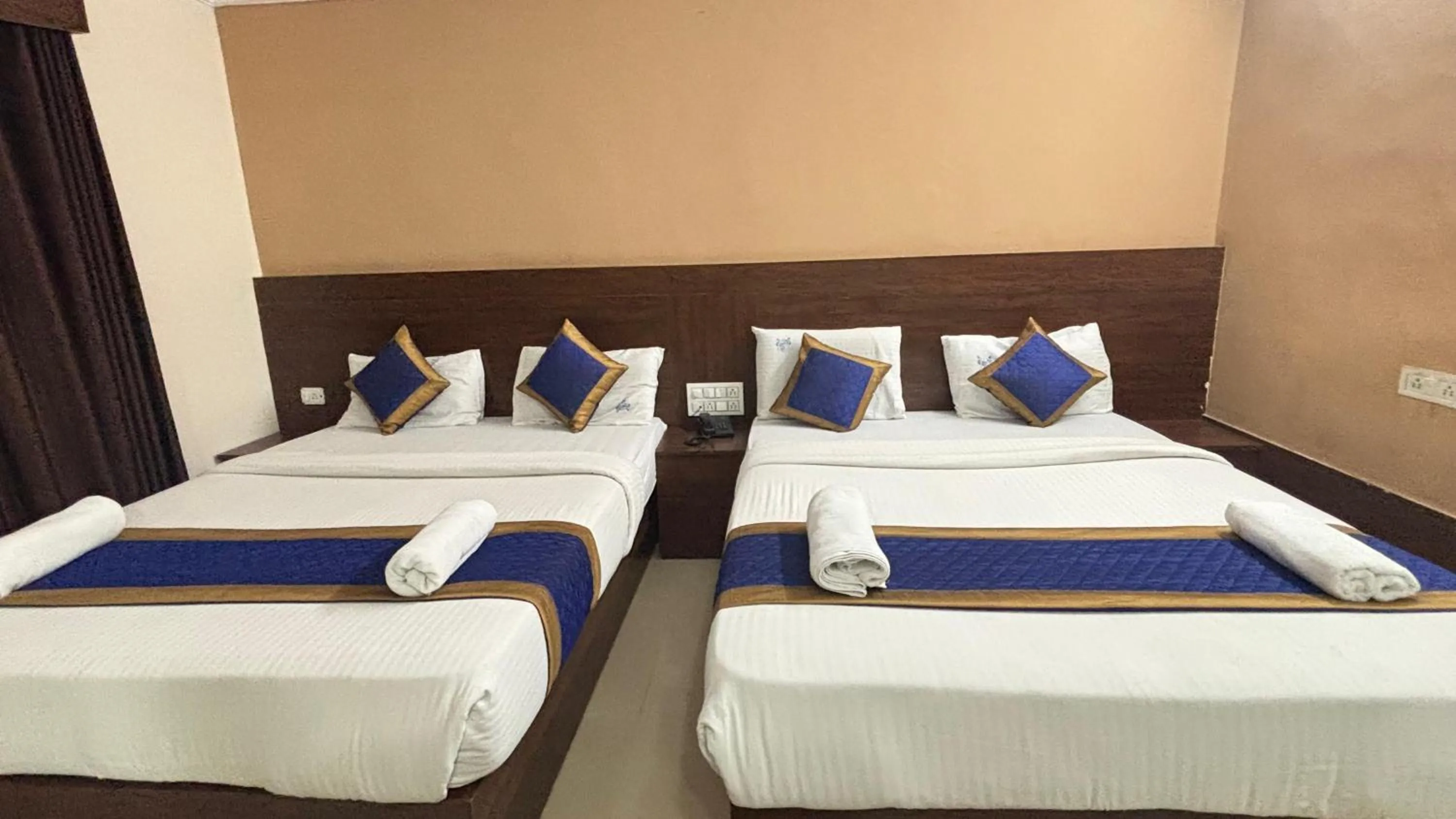 Bed in Hotel Chetan International