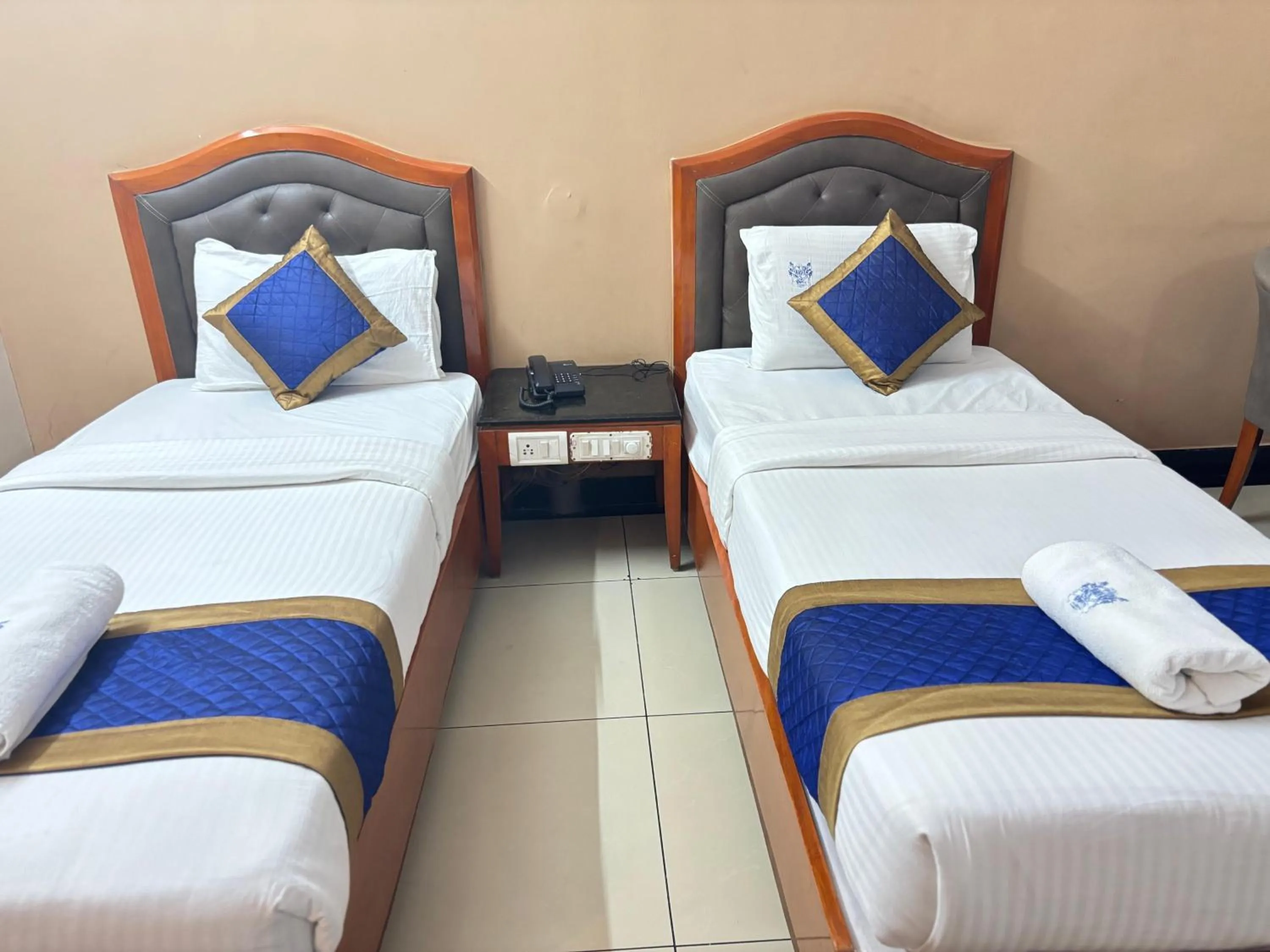 Bed in Hotel Chetan International