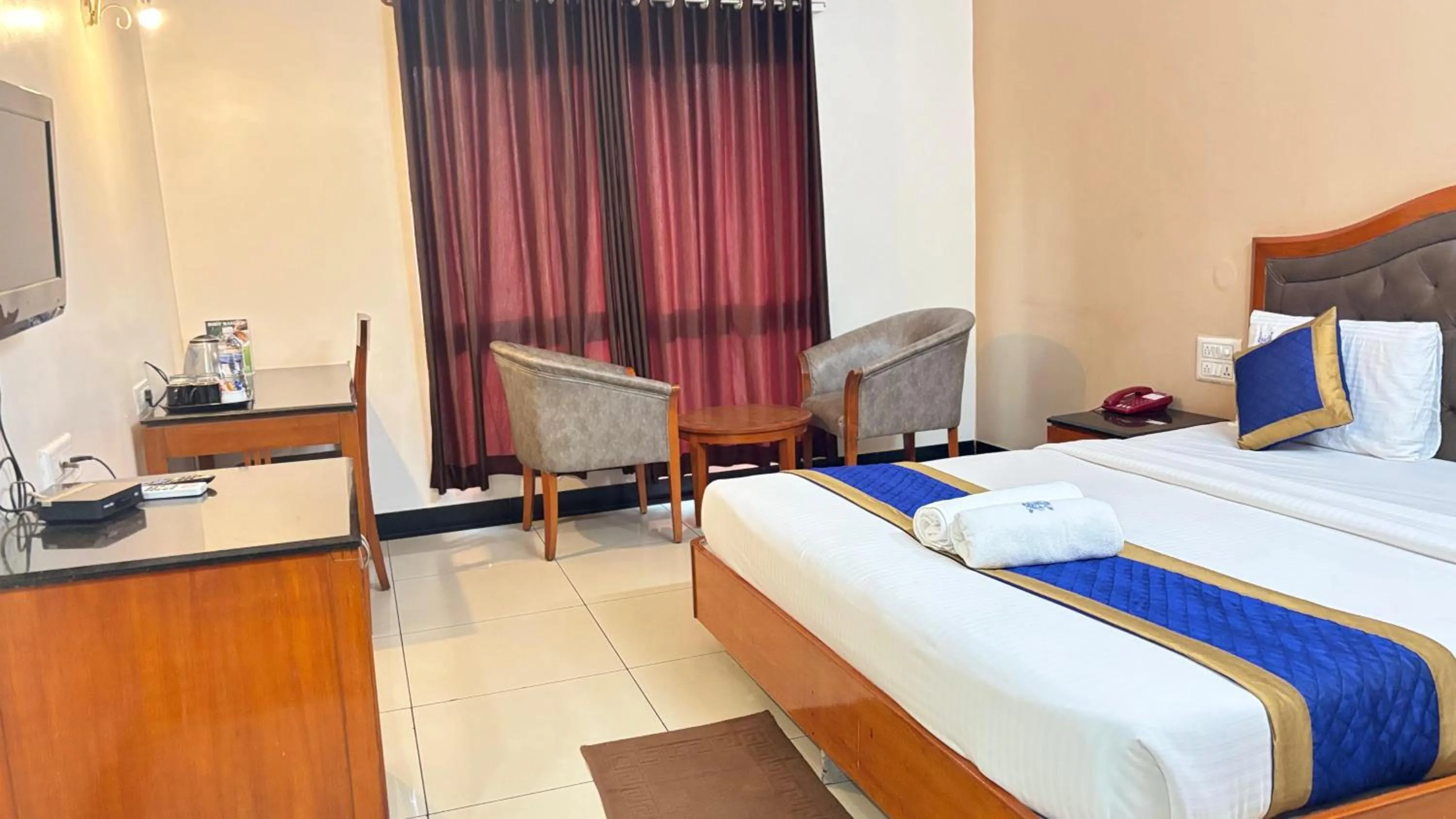 Bed in Hotel Chetan International