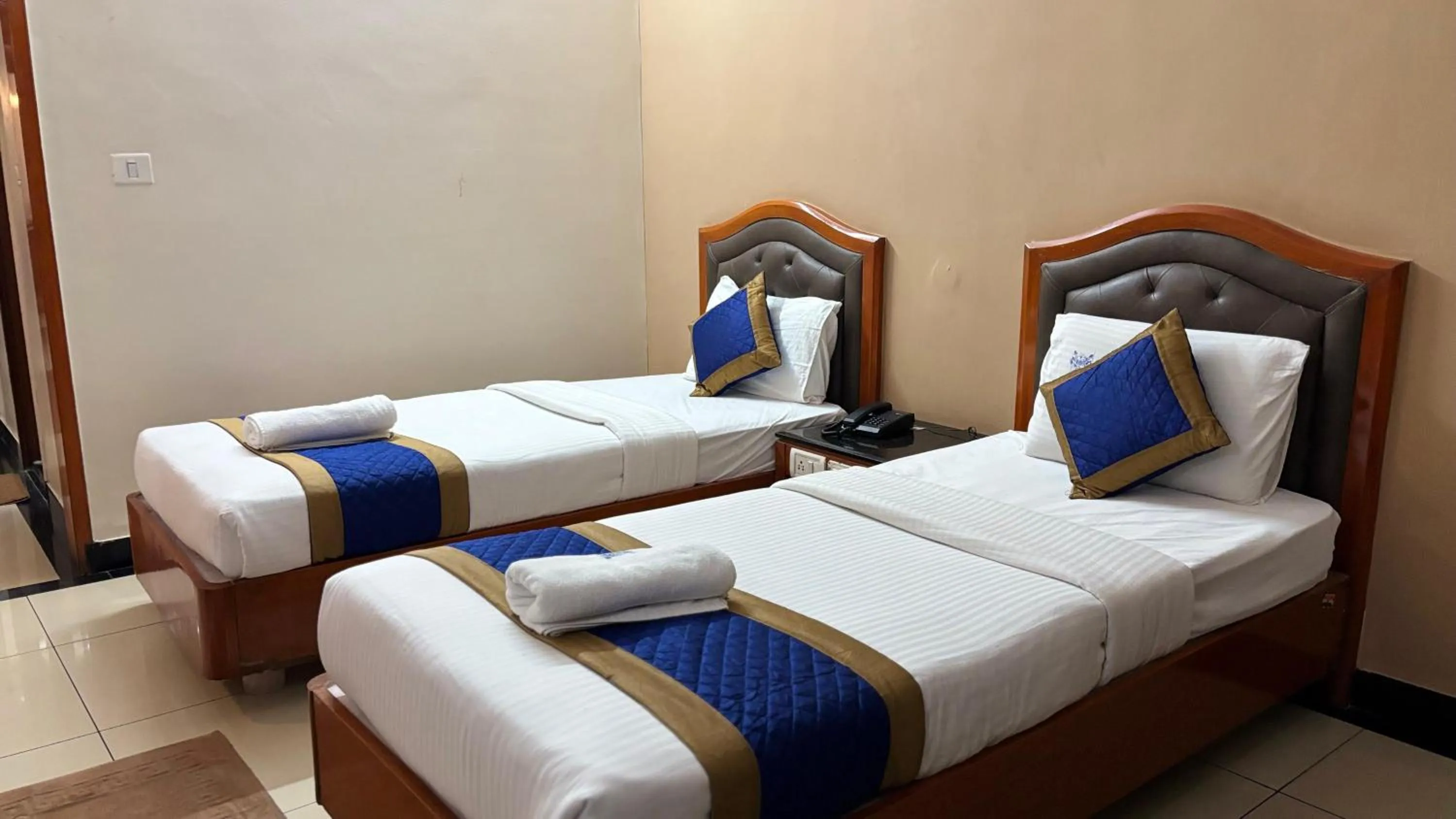Bed in Hotel Chetan International