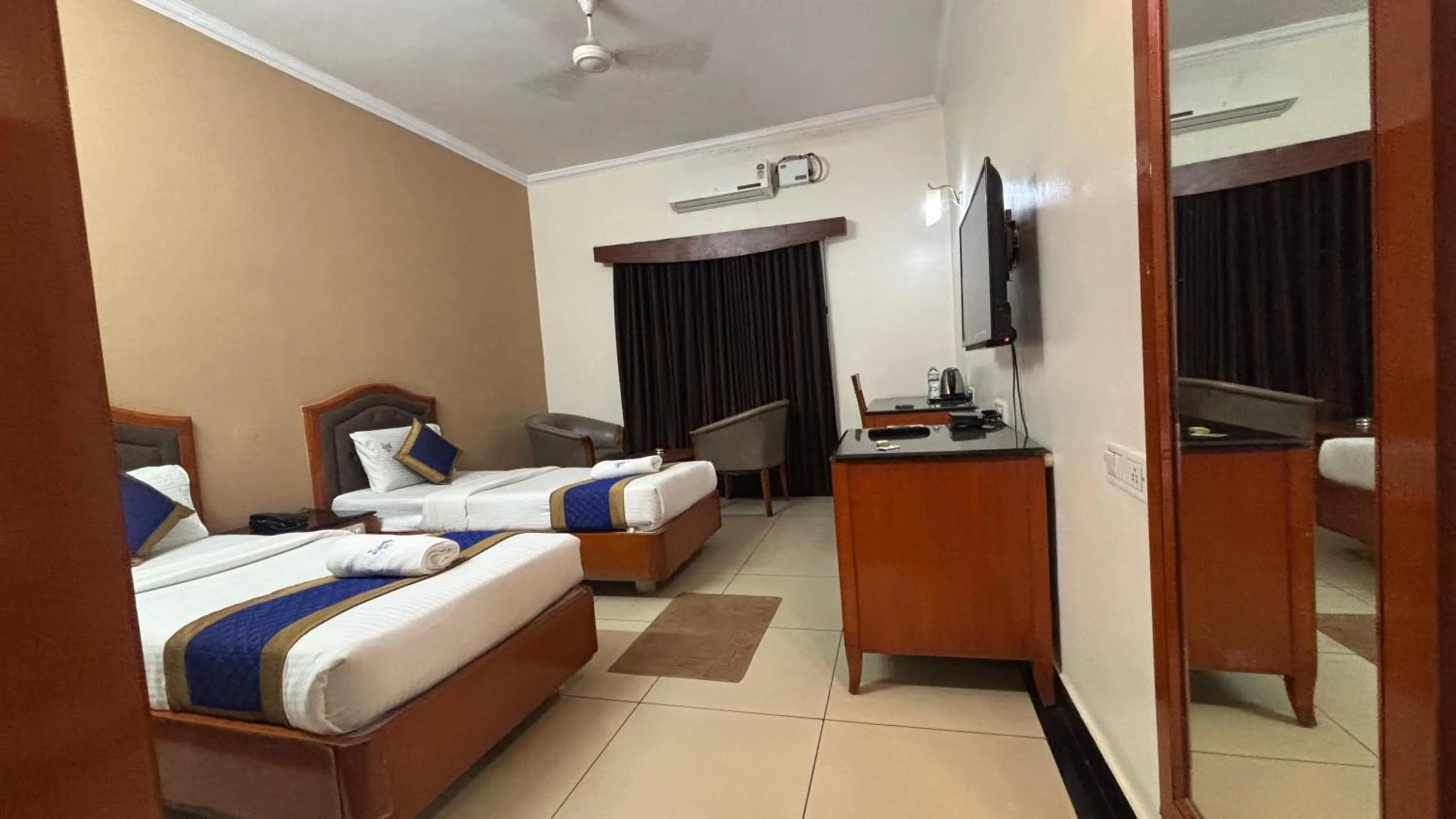 Bed in Hotel Chetan International