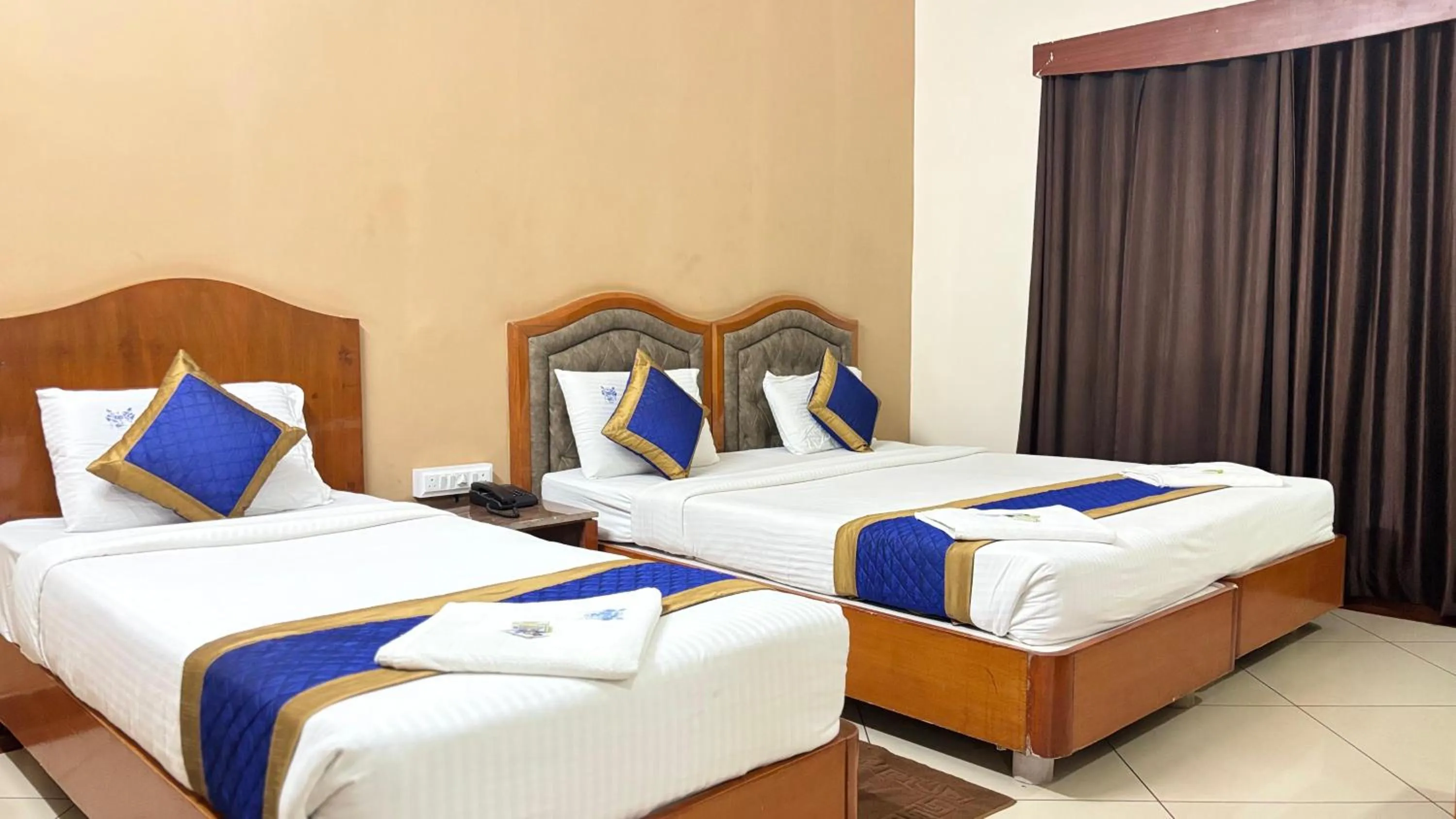 Bed in Hotel Chetan International