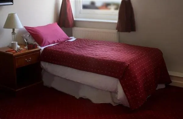 Photo of the whole room, Bed in The Griffin Hotel