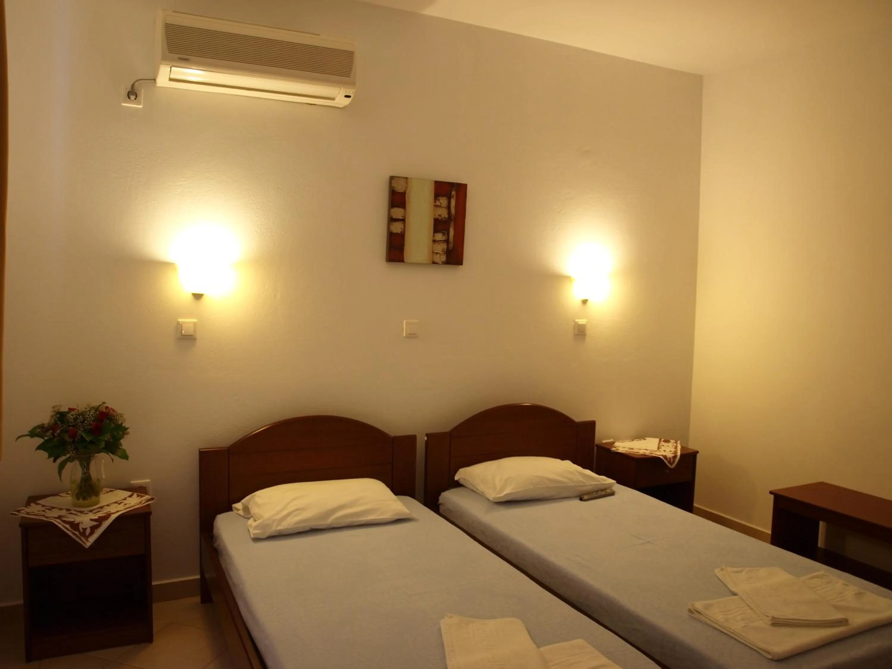 Bed in Golden Sun Apartments