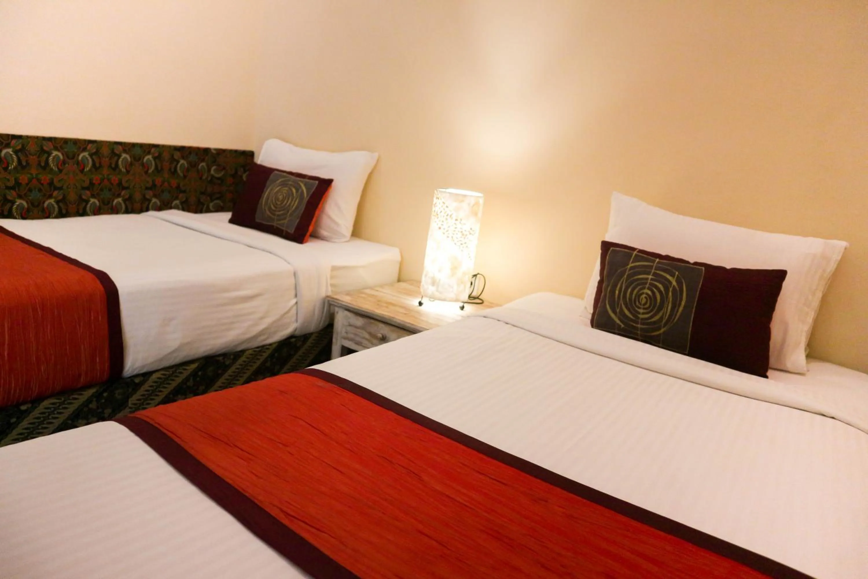 Bed in The Lumbung Jaya by Uniquecations