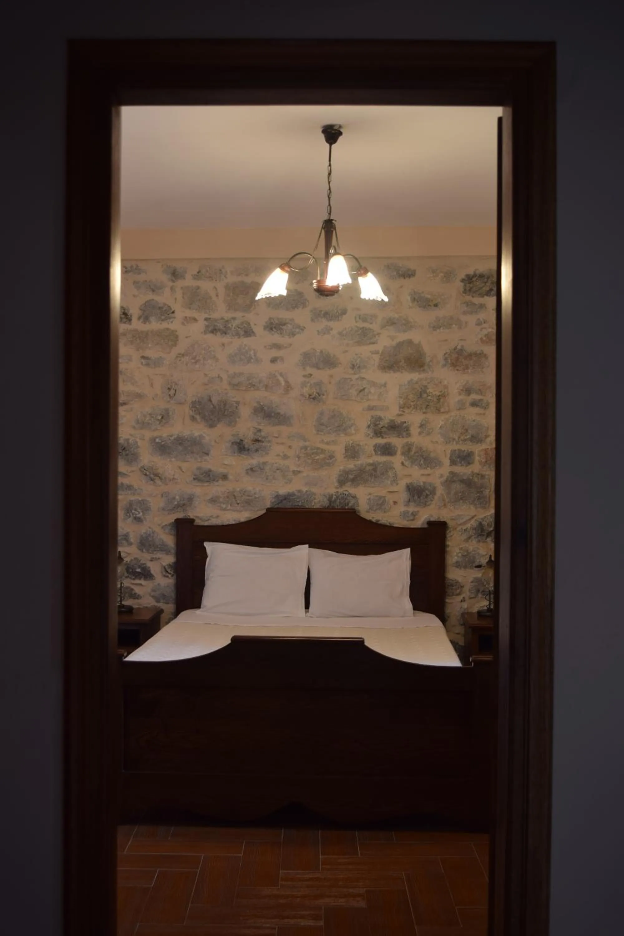 Bed in Vasilios Apartments Hotel