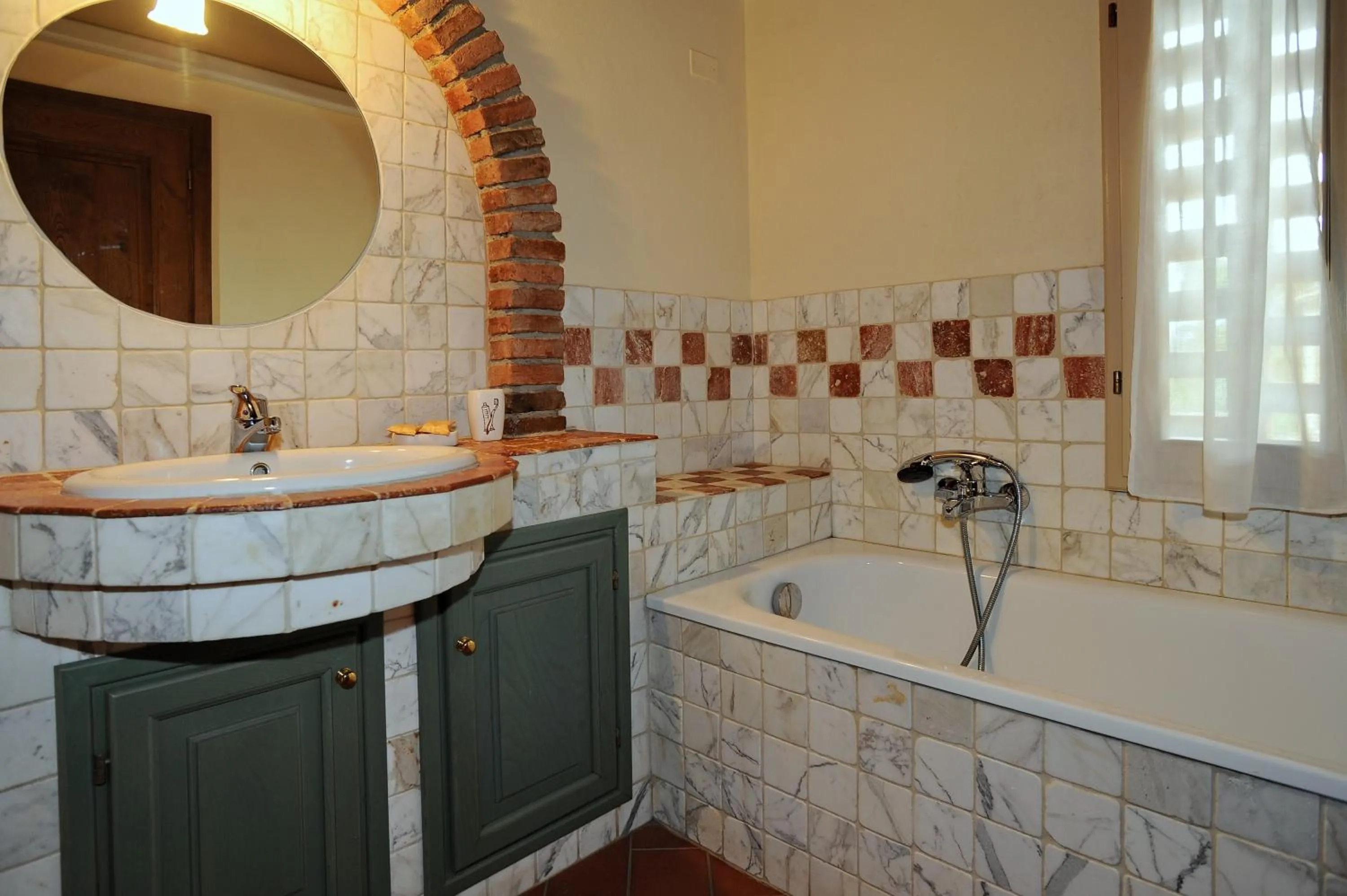 Bathroom in Erboli Residence