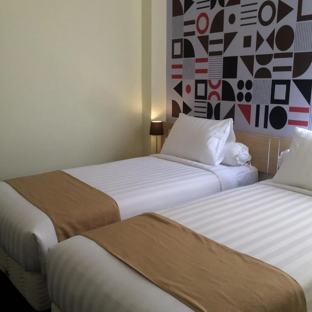 Bed in Front One Inn Kediri
