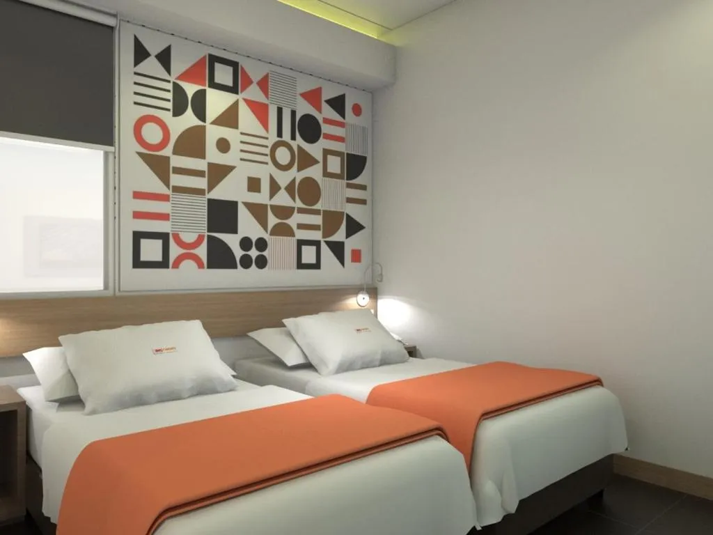 Bed in Front One Inn Kediri