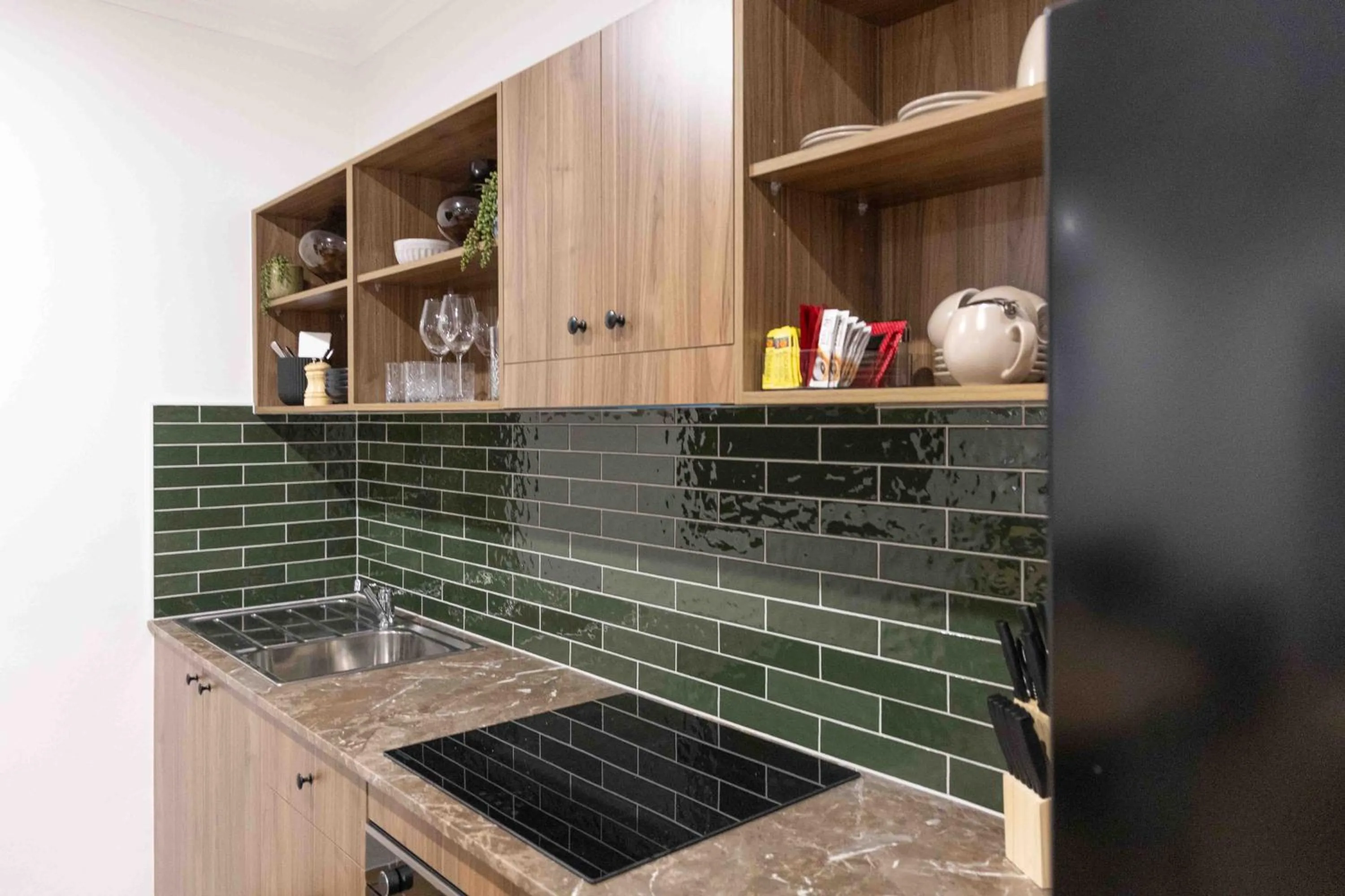 Kitchen or kitchenette in The Metropolitan Hotel