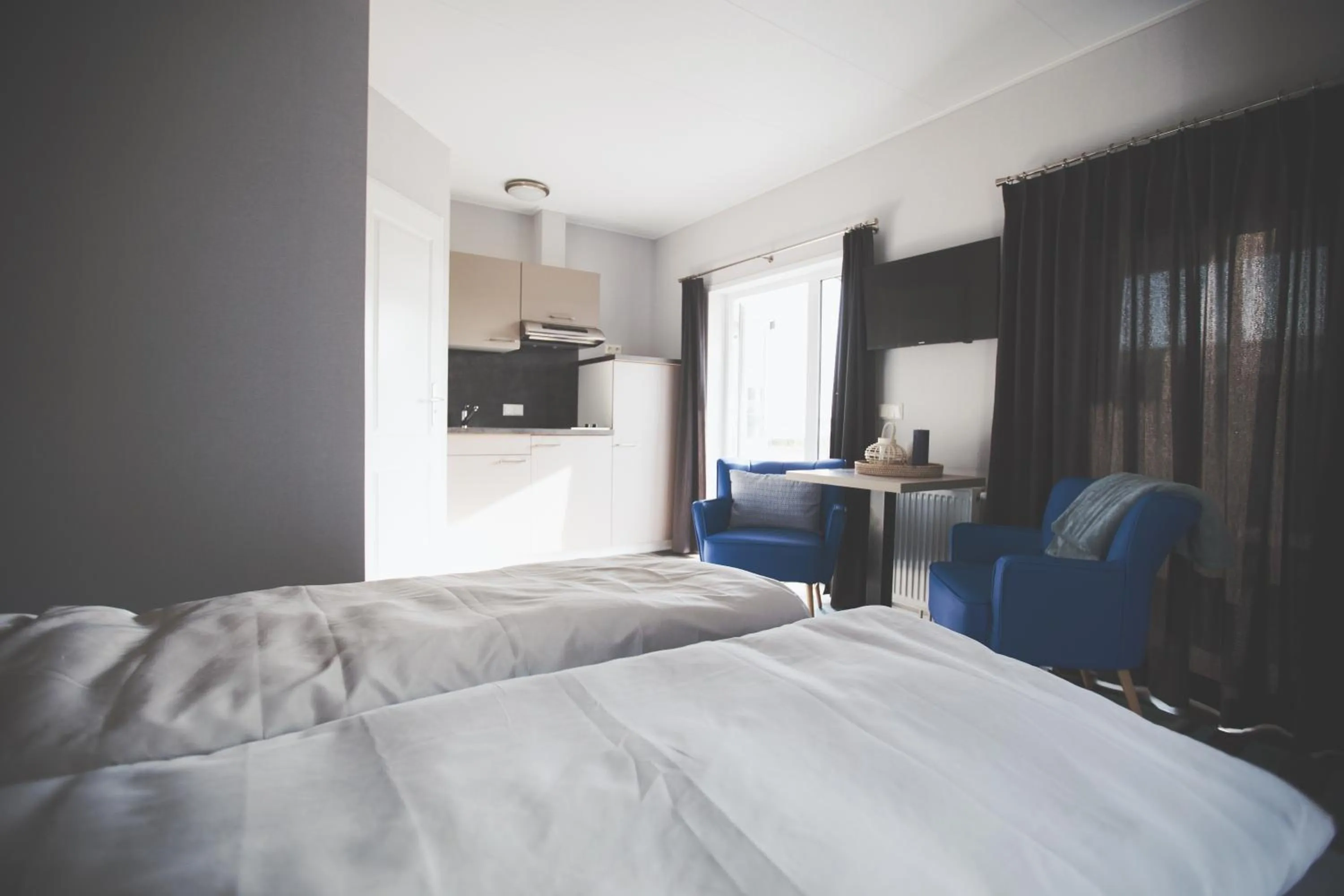 Kitchen or kitchenette, Bed in Lodgepark Goitzsche GmbH