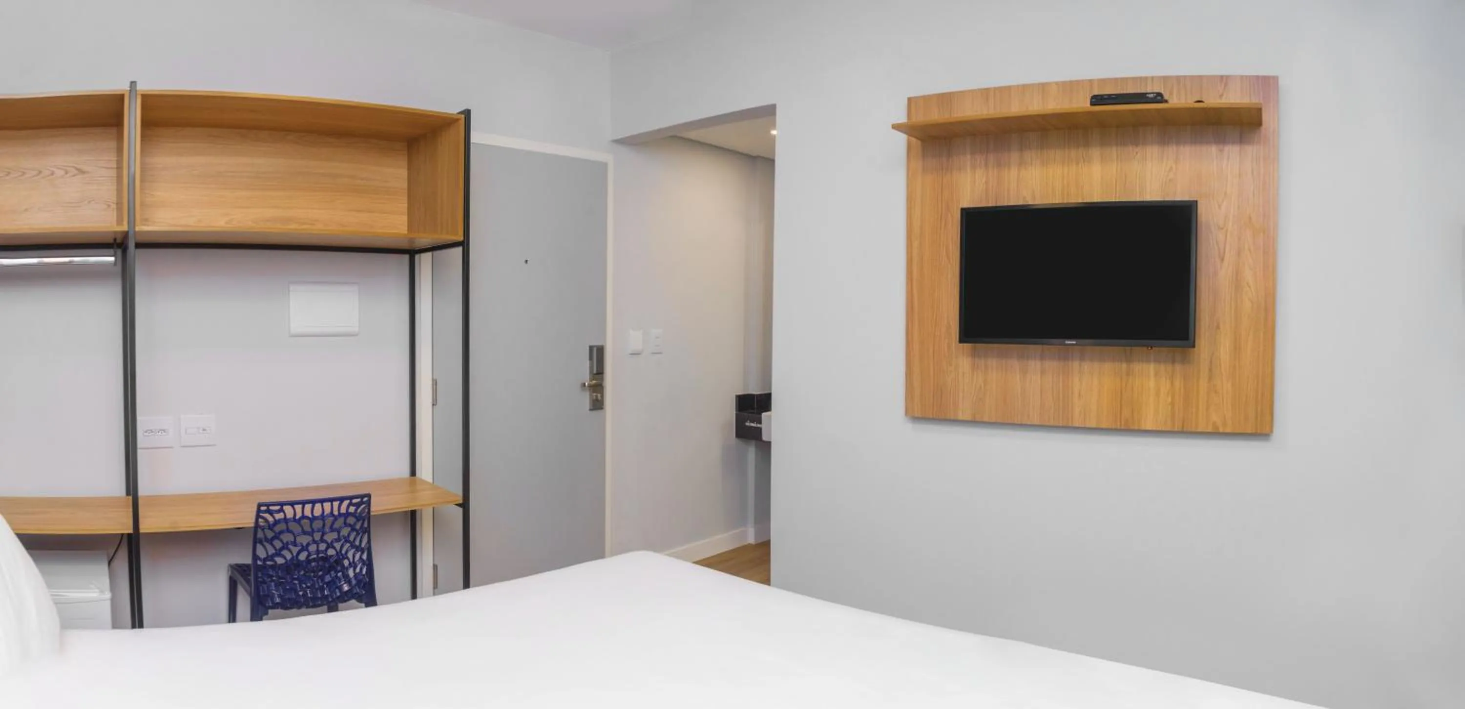 Communal lounge/ TV room, Bed in Plaza Inn Trevo Sorocaba