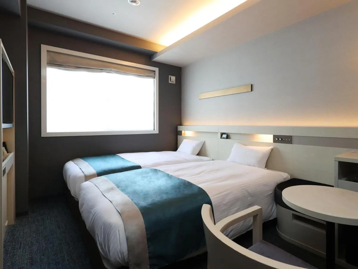 Bed in Urban Hotel Kyoto Shijo Premium