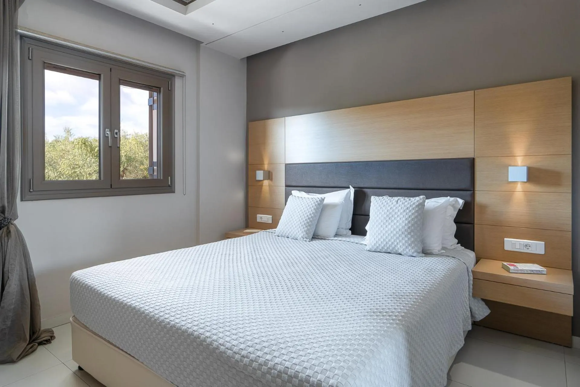 Bed in Kymothoe Elite Suites