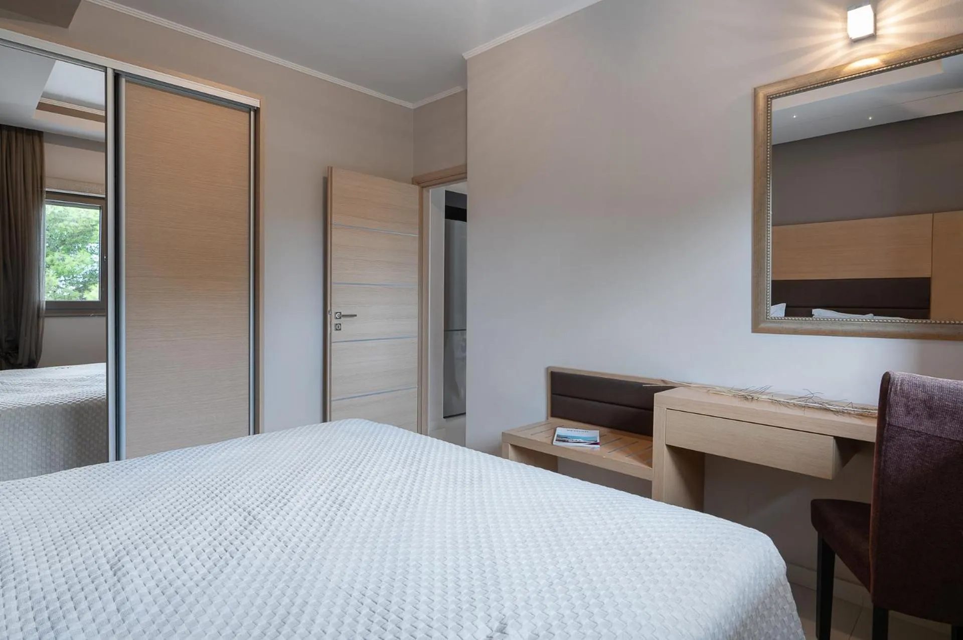 Bed in Kymothoe Elite Suites