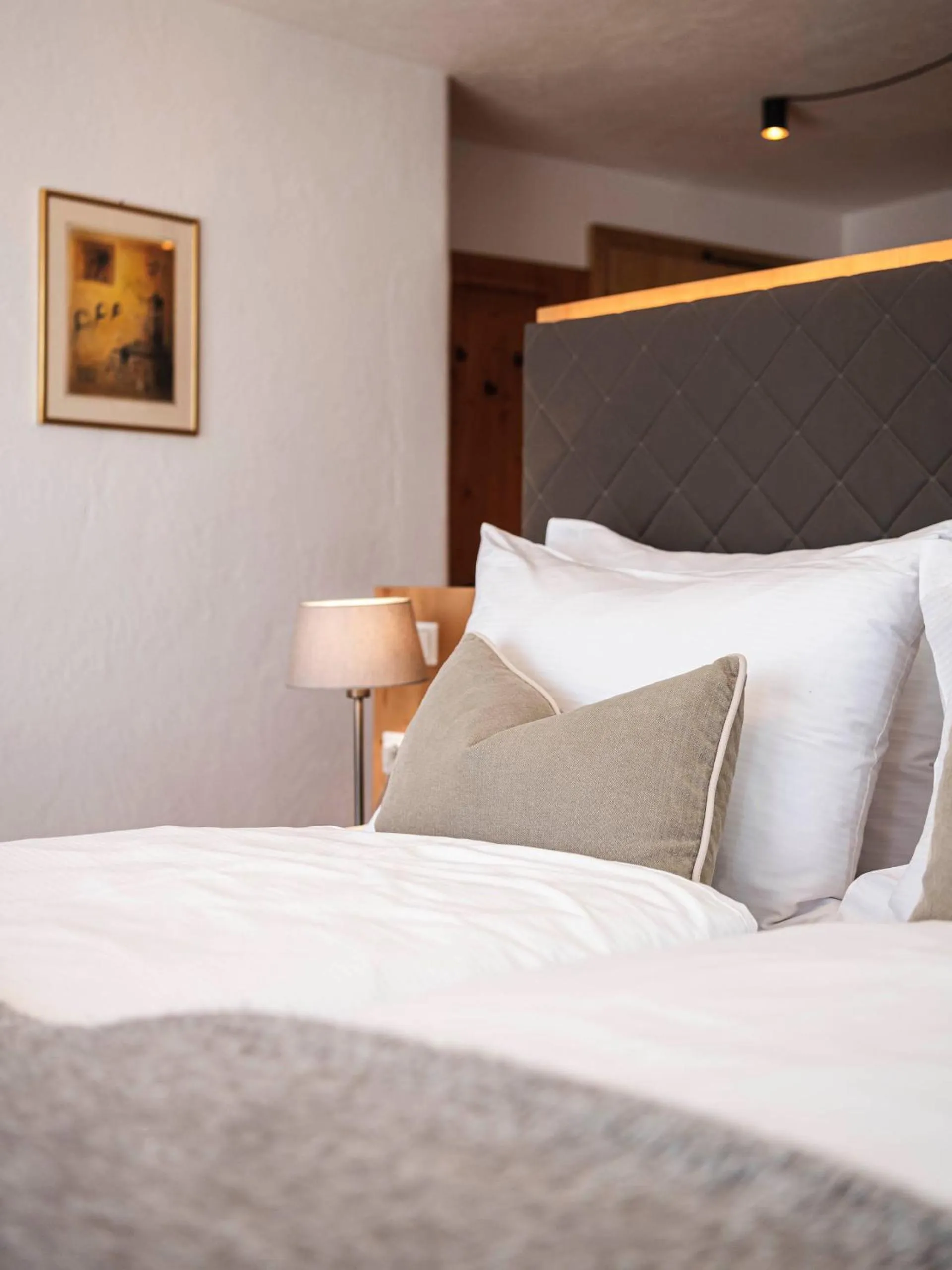 Bed in Chalet Grumer Suites&Spa