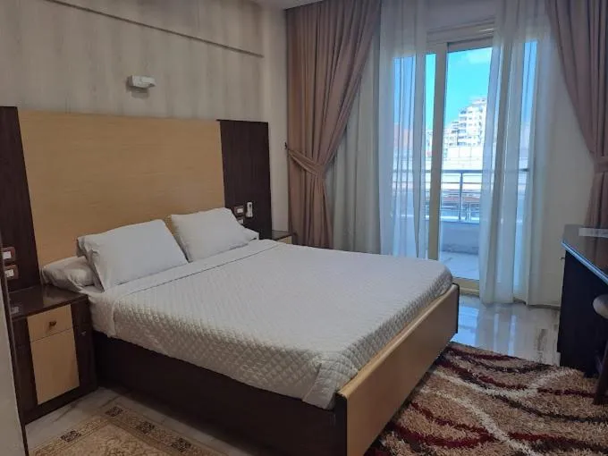 Photo of the whole room, Bed in Dolphin Ras El-Bar Hotel