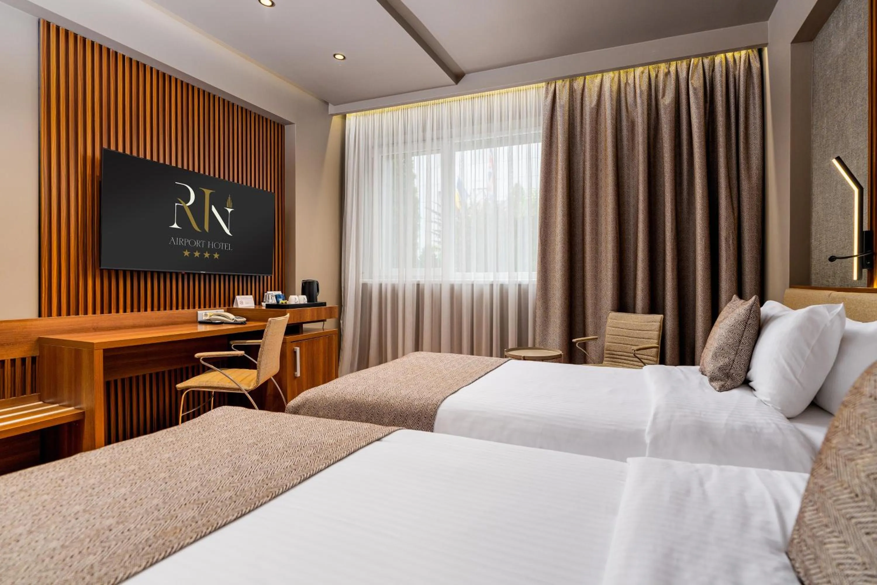Bed in RIN Airport Hotel