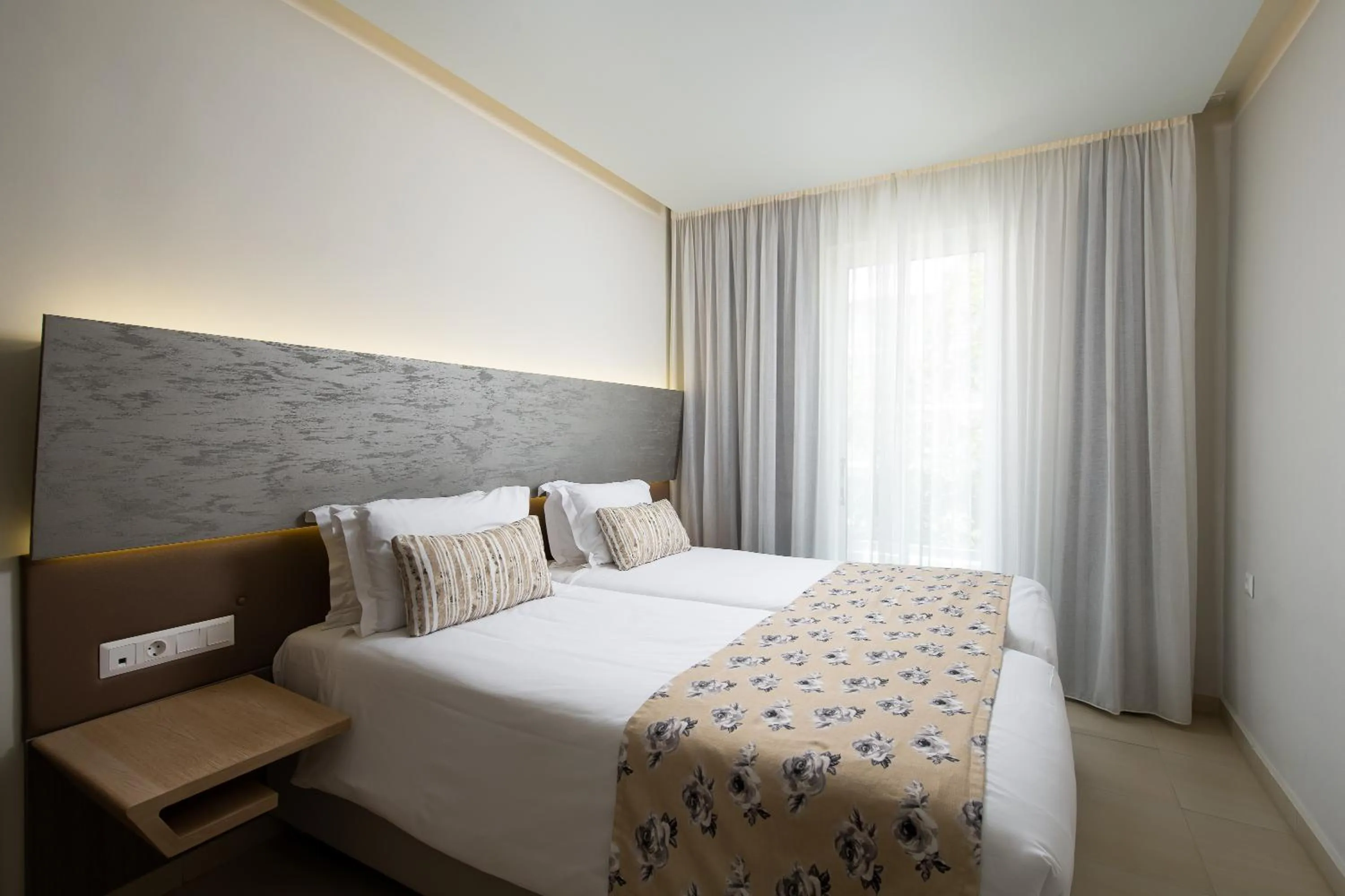 Bed in Melrose Rethymno by Mage Hotels