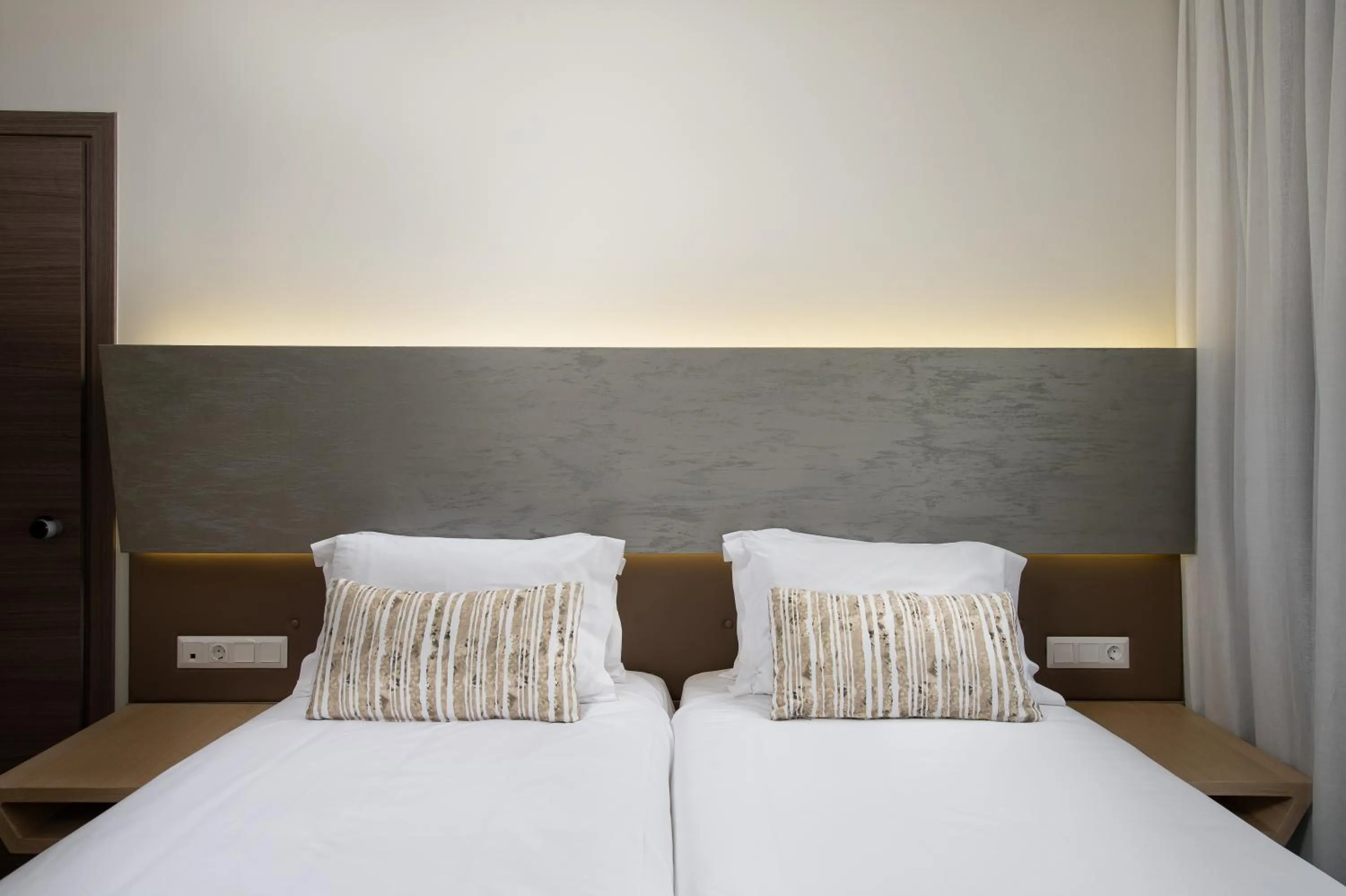 Bed in Melrose Rethymno by Mage Hotels