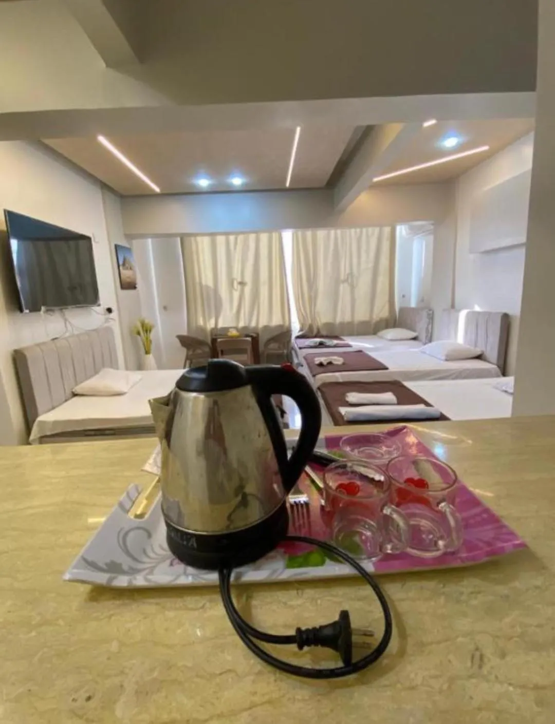 Bed in Pyramids Family Inn