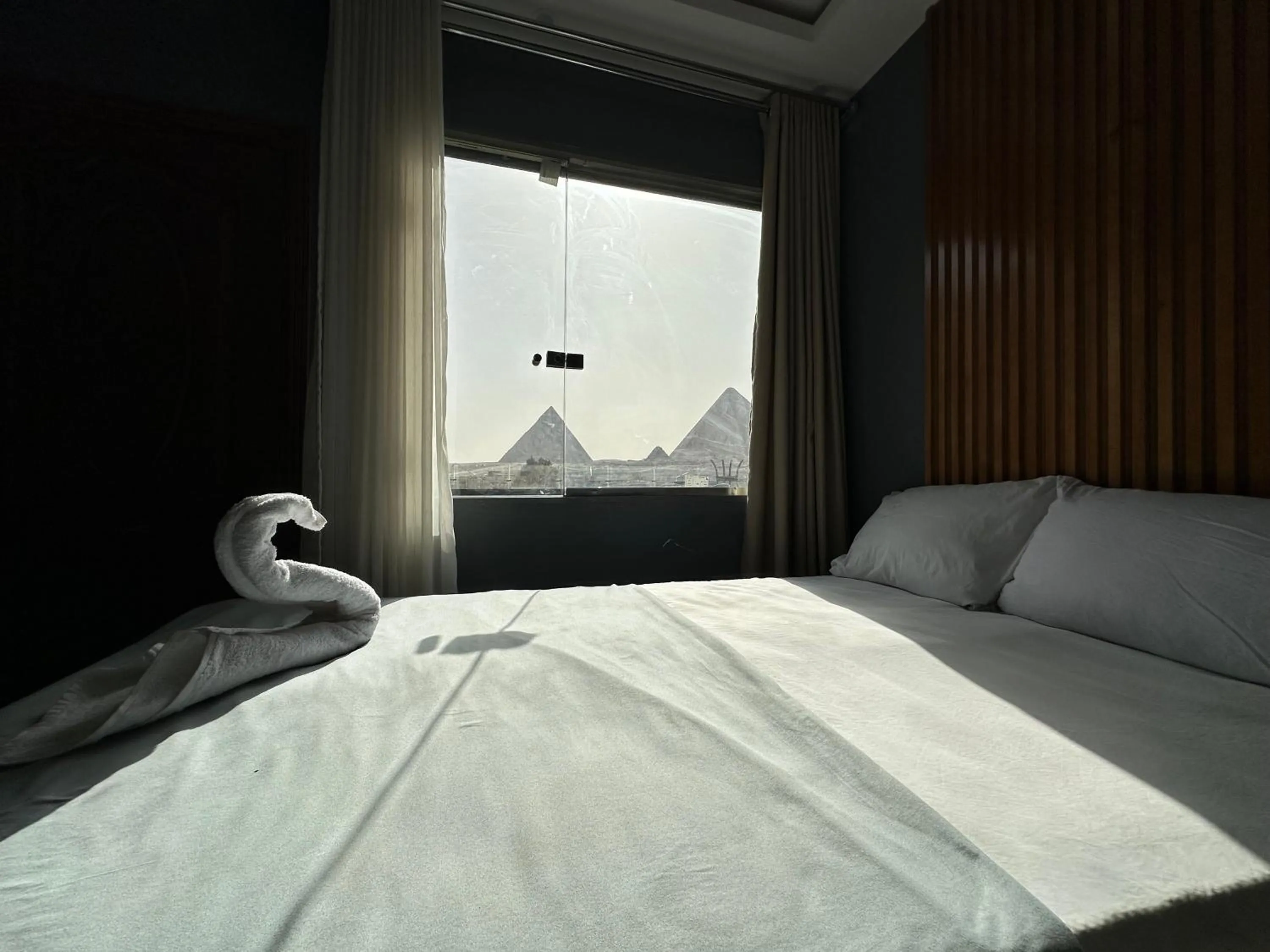 Bed in Pyramids Family Inn