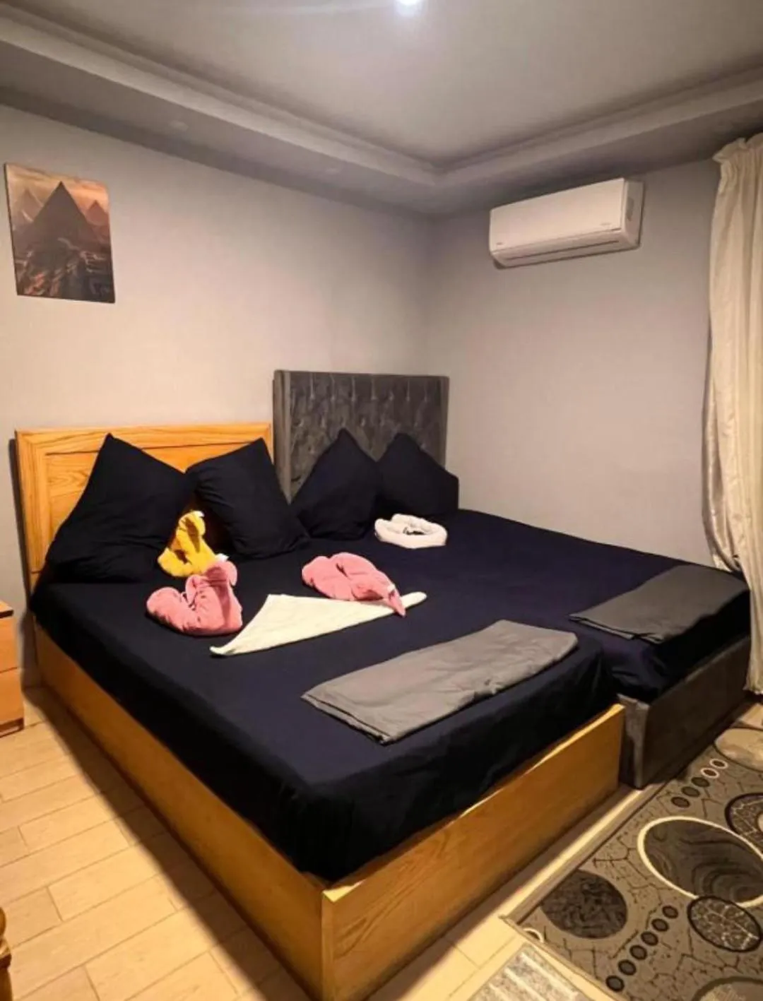 Bed in Pyramids Family Inn