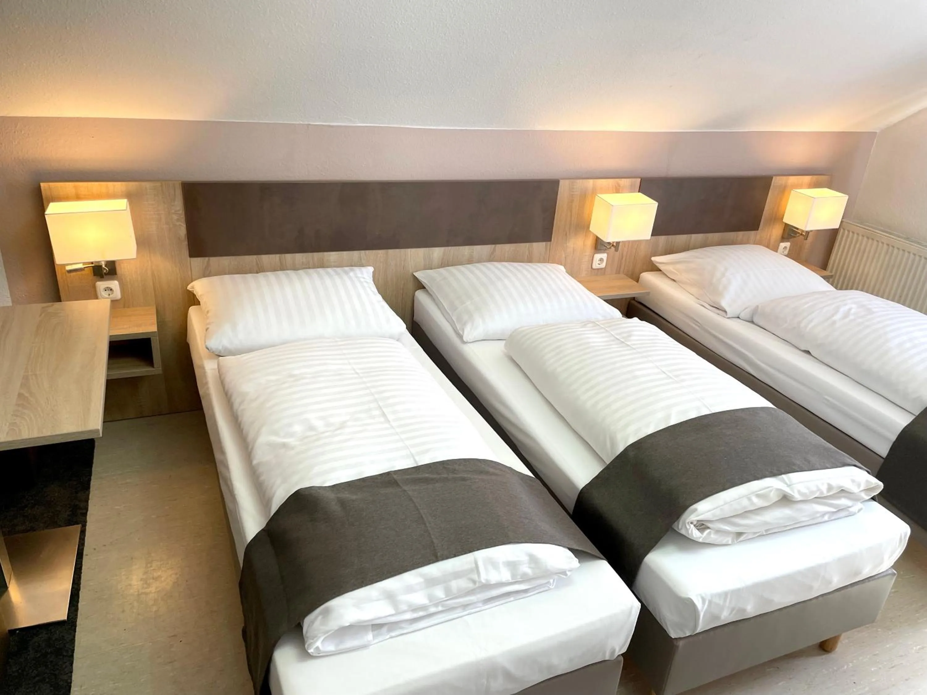 Bed in Hana Aparthotel