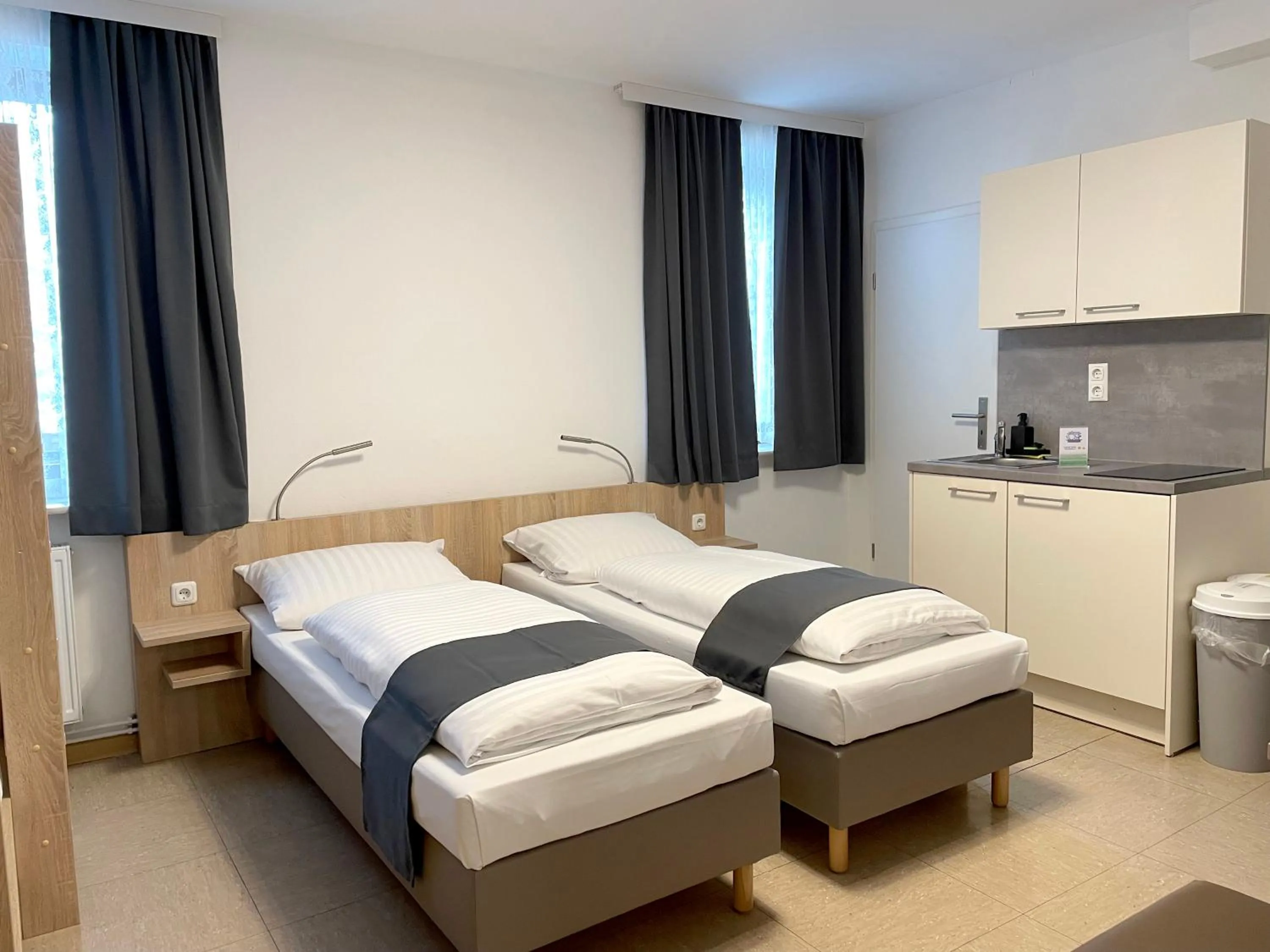 Bed in Hana Aparthotel