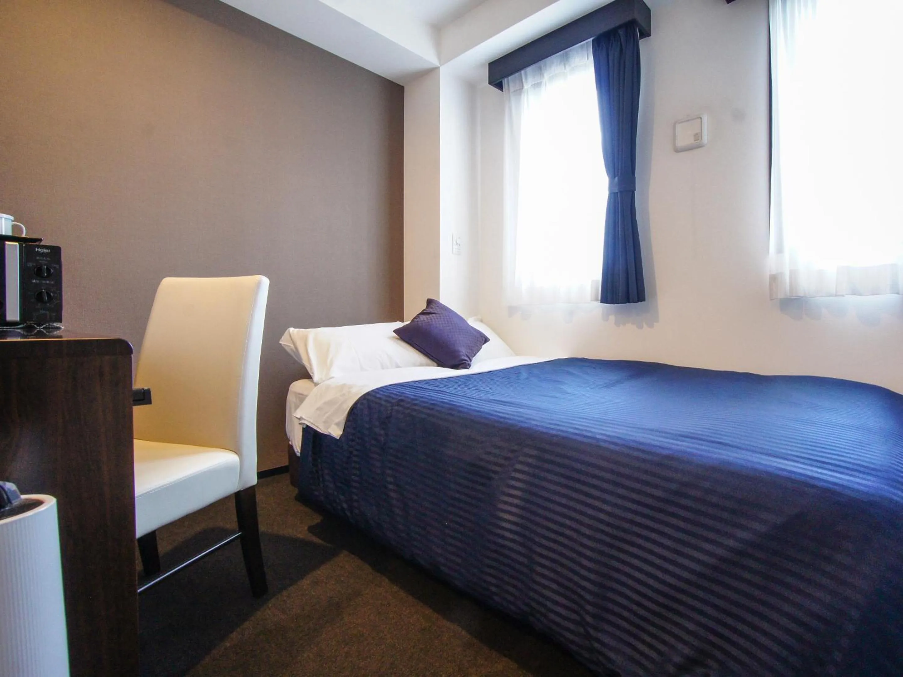 Bed in HOTEL LiVEMAX Sagamihara Ekimae