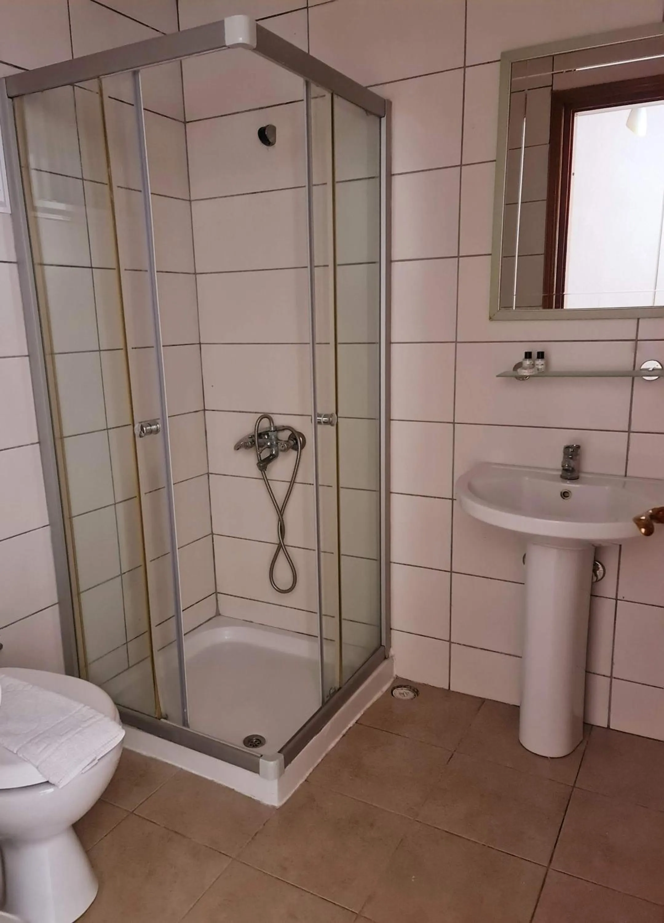 Bathroom in Nagi Beach Hotel