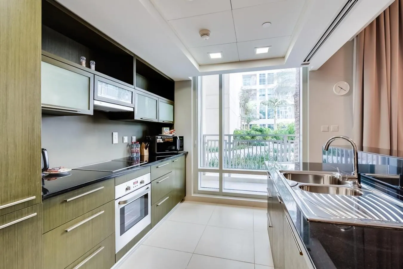 Kitchen or kitchenette in OSKENA Vacation Homes -The Lofts Boulevard Downtown