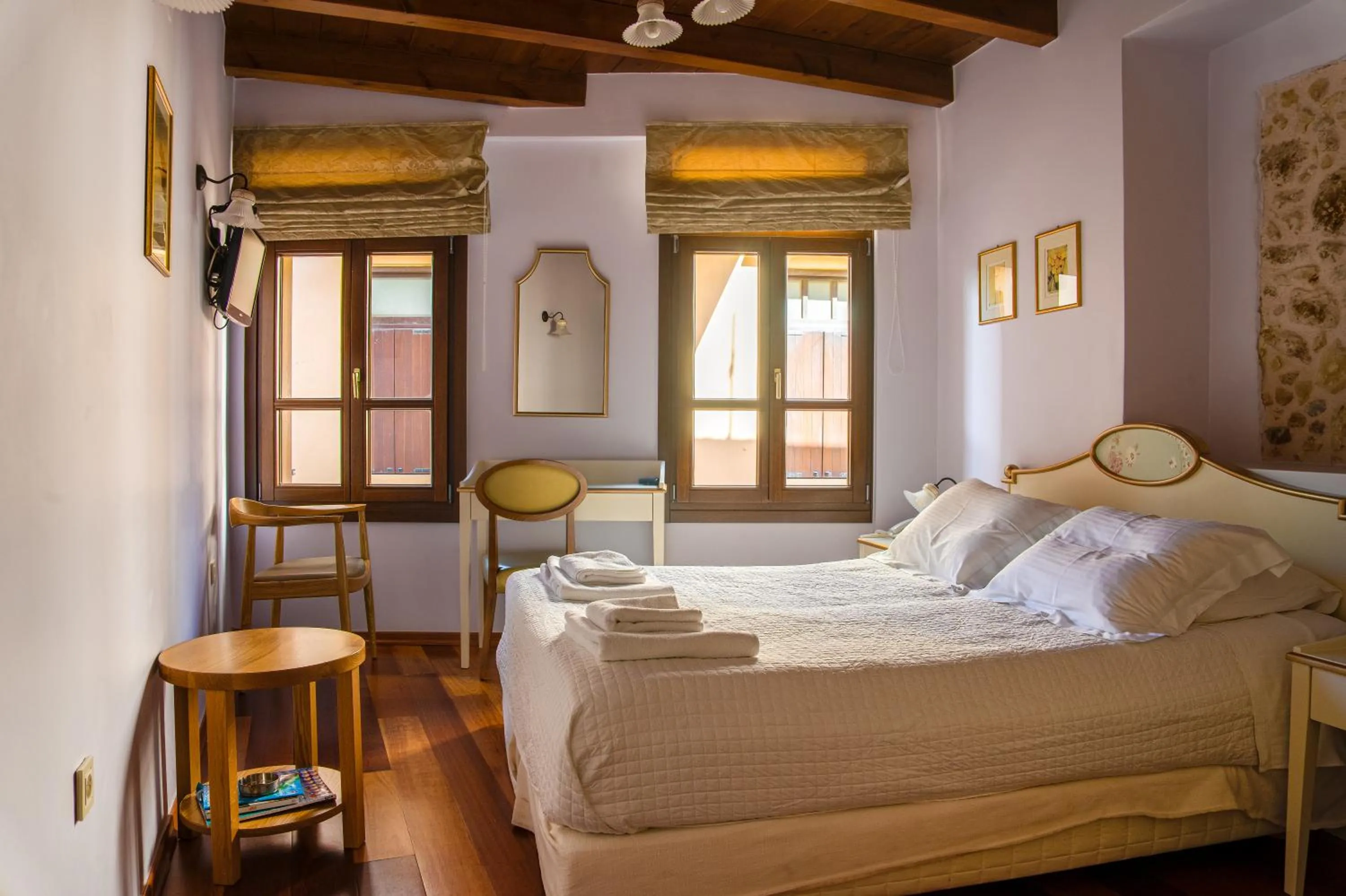 Photo of the whole room, Bed in Palazzo Duca