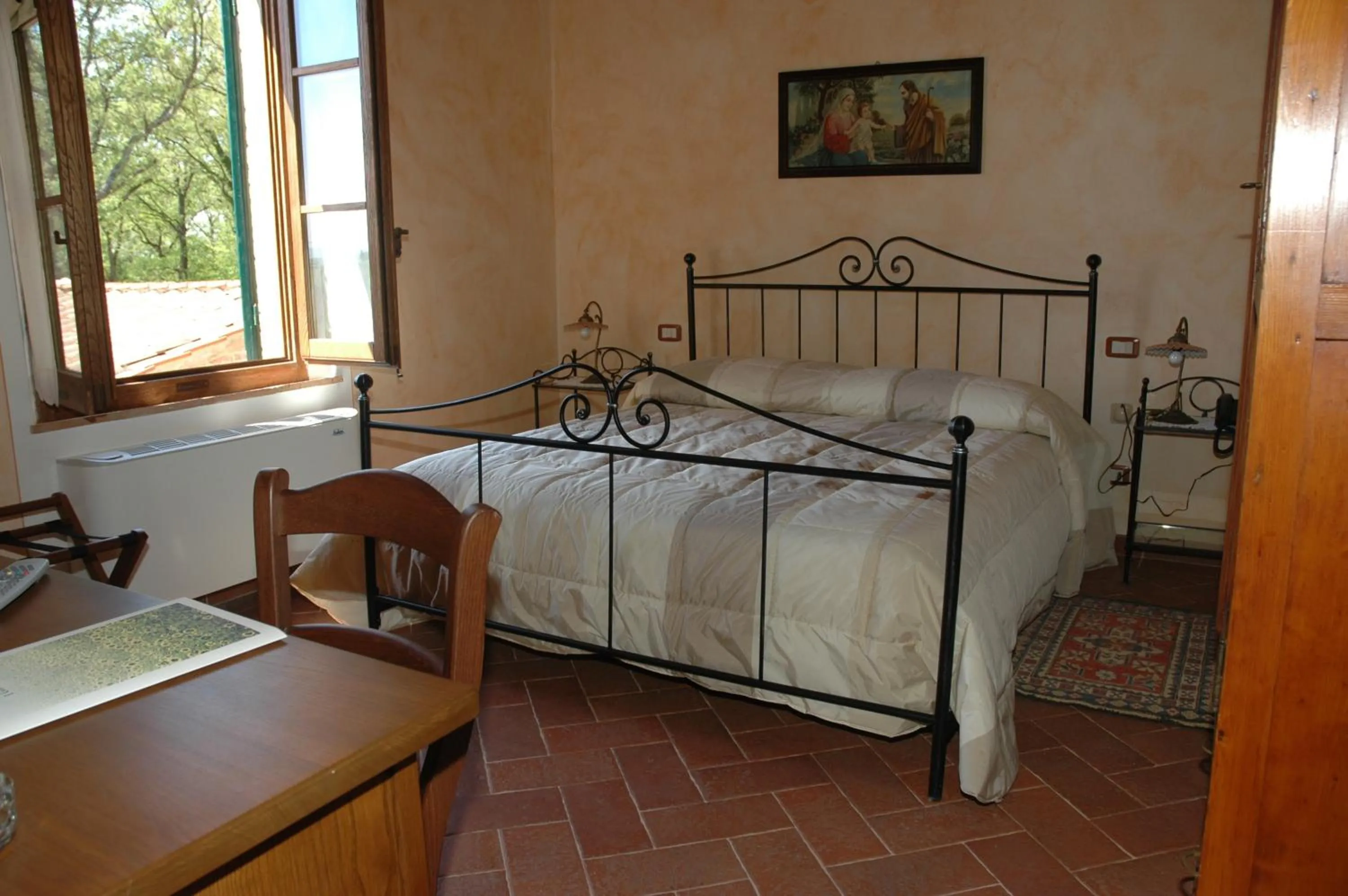 Bed in Piccolo Hotel San Valentino