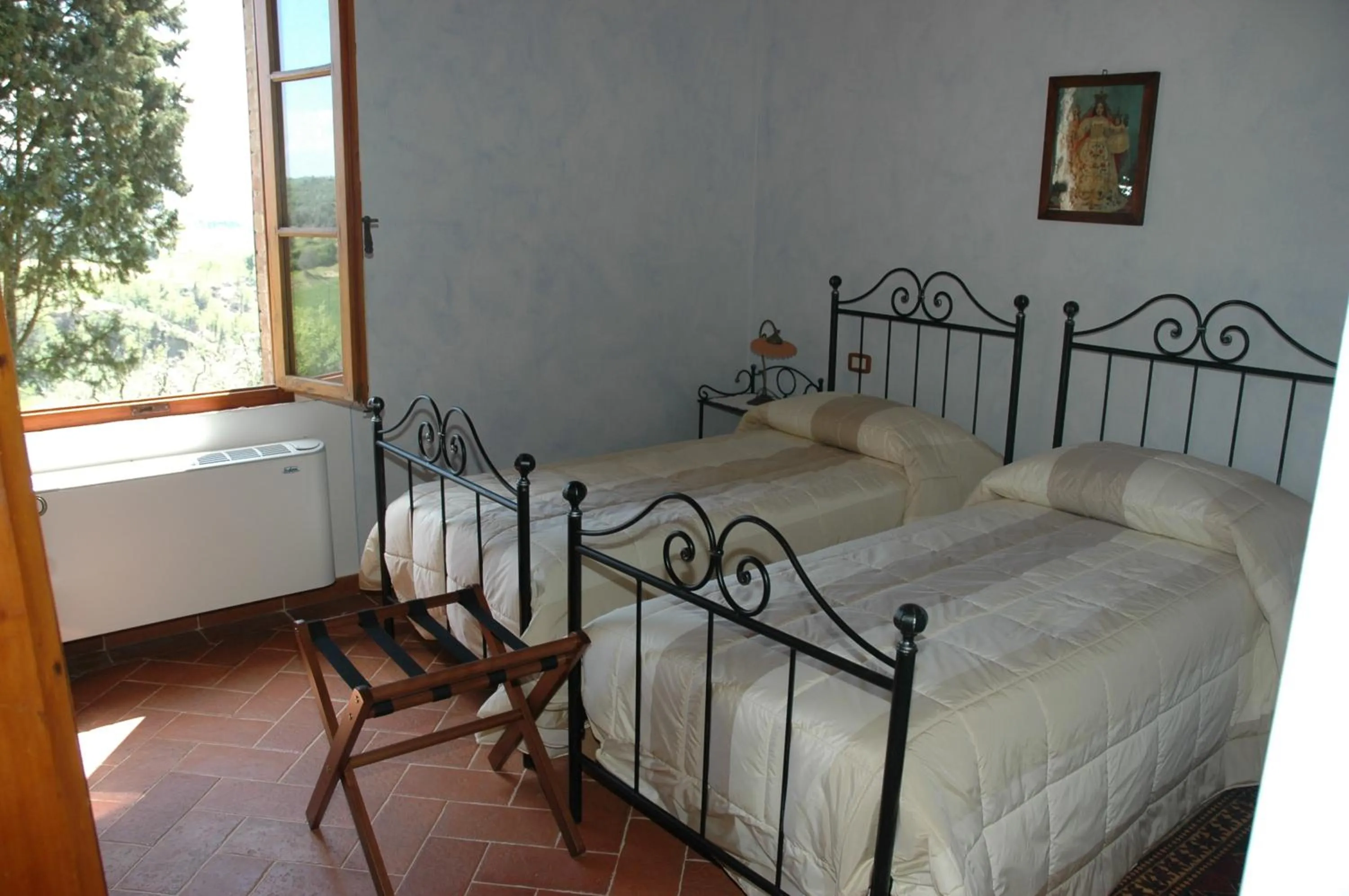 Bed in Piccolo Hotel San Valentino