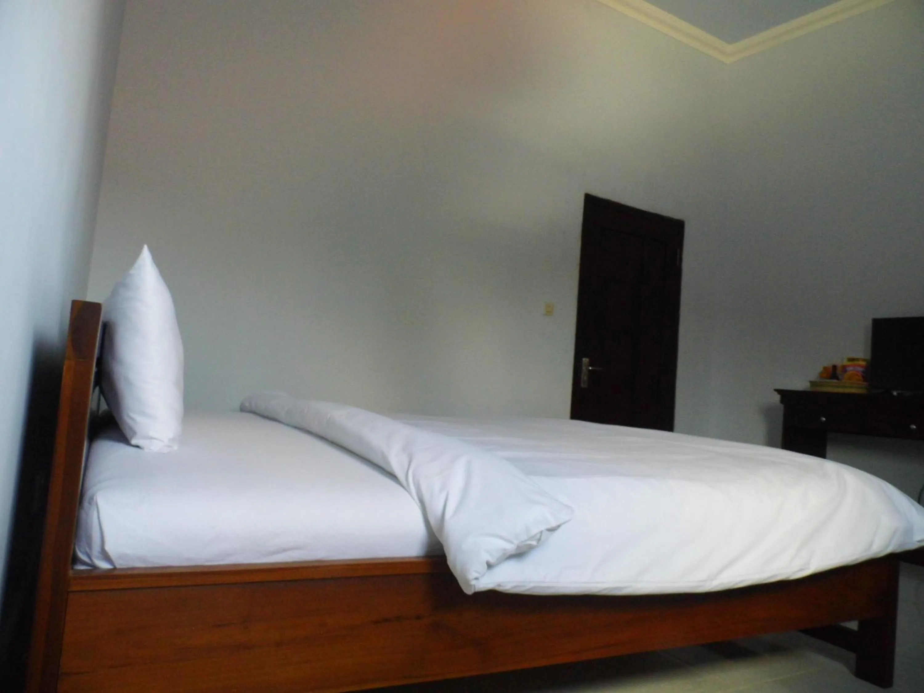 Bed in Hotel Ilhami Blitar