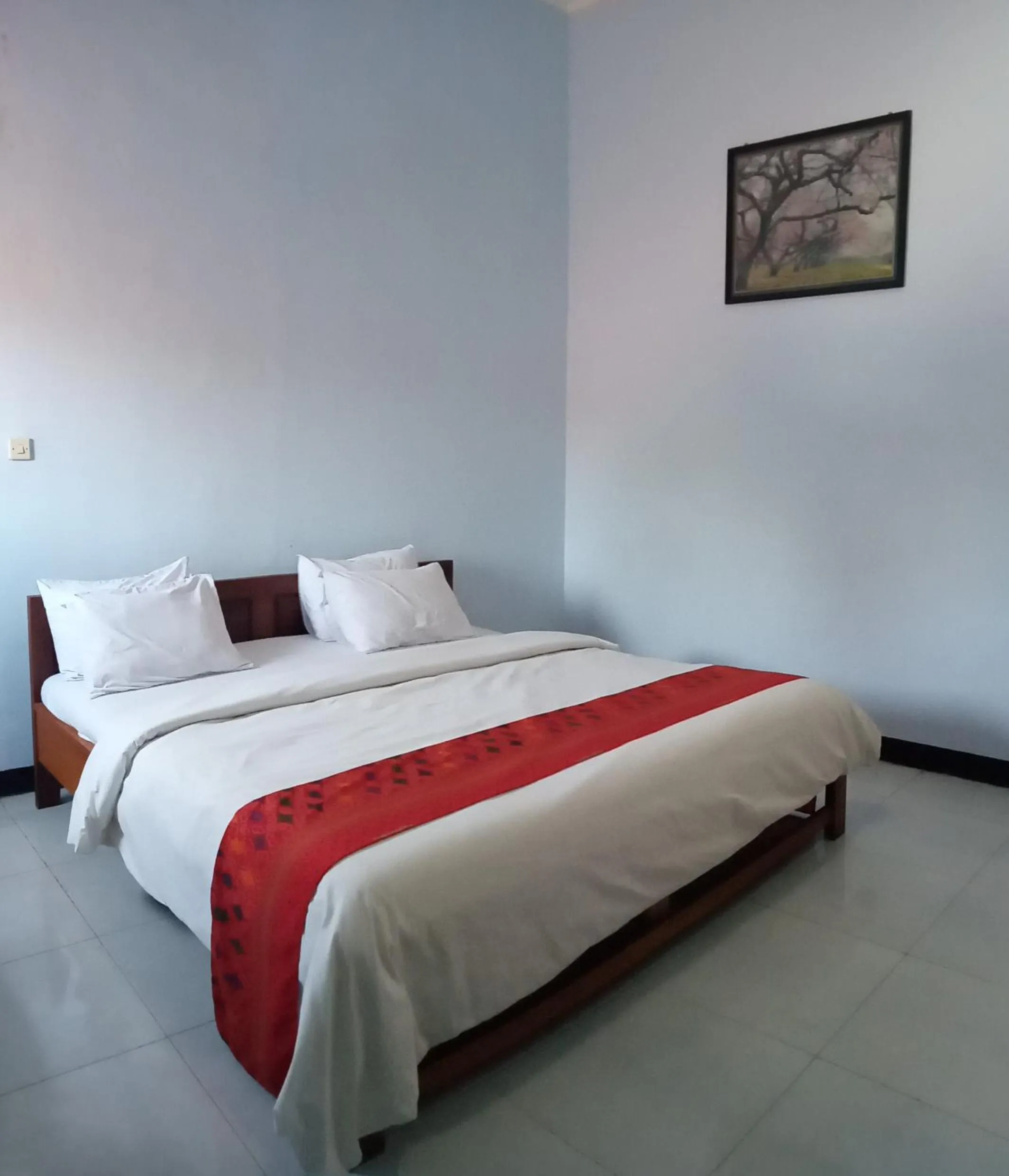 Bed in Hotel Ilhami Blitar