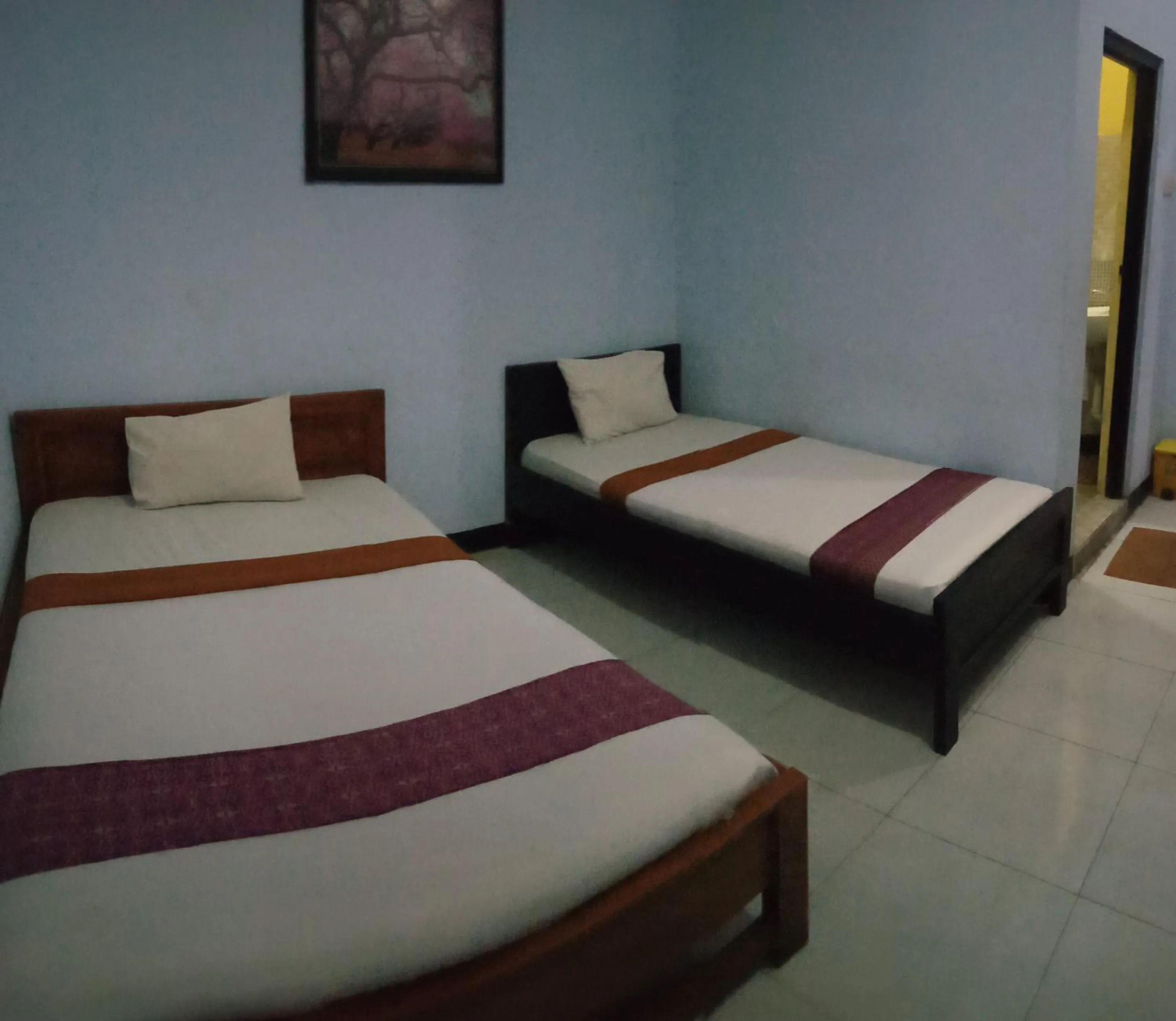 Bed in Hotel Ilhami Blitar