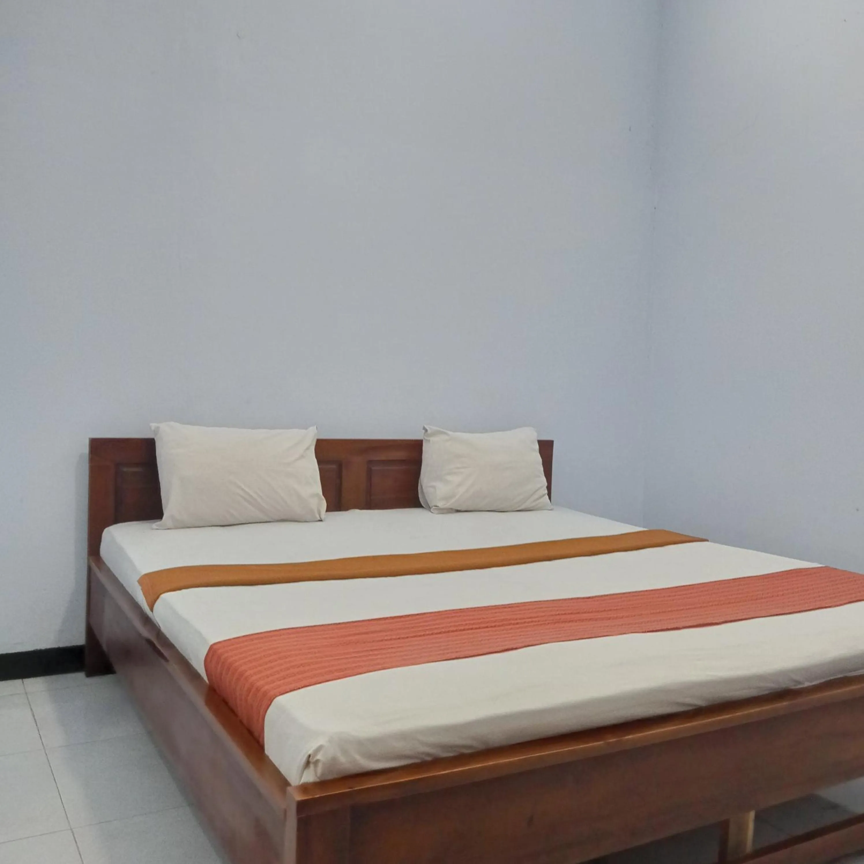 Bed in Hotel Ilhami Blitar