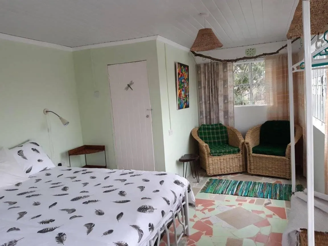 Bed in Aloepark Art Hotel